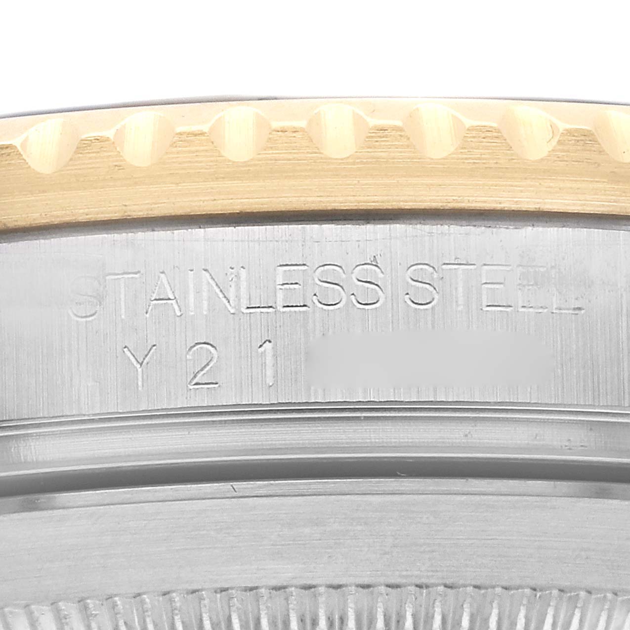 The image shows a close-up of the side case and bezel, featuring "STAINLESS STEEL" engraving on a Rolex Submariner 16613 Men's Steel and Gold (two tone) Black Dial 16613 Men's Steel and Gold (two tone) Black Dial watch.