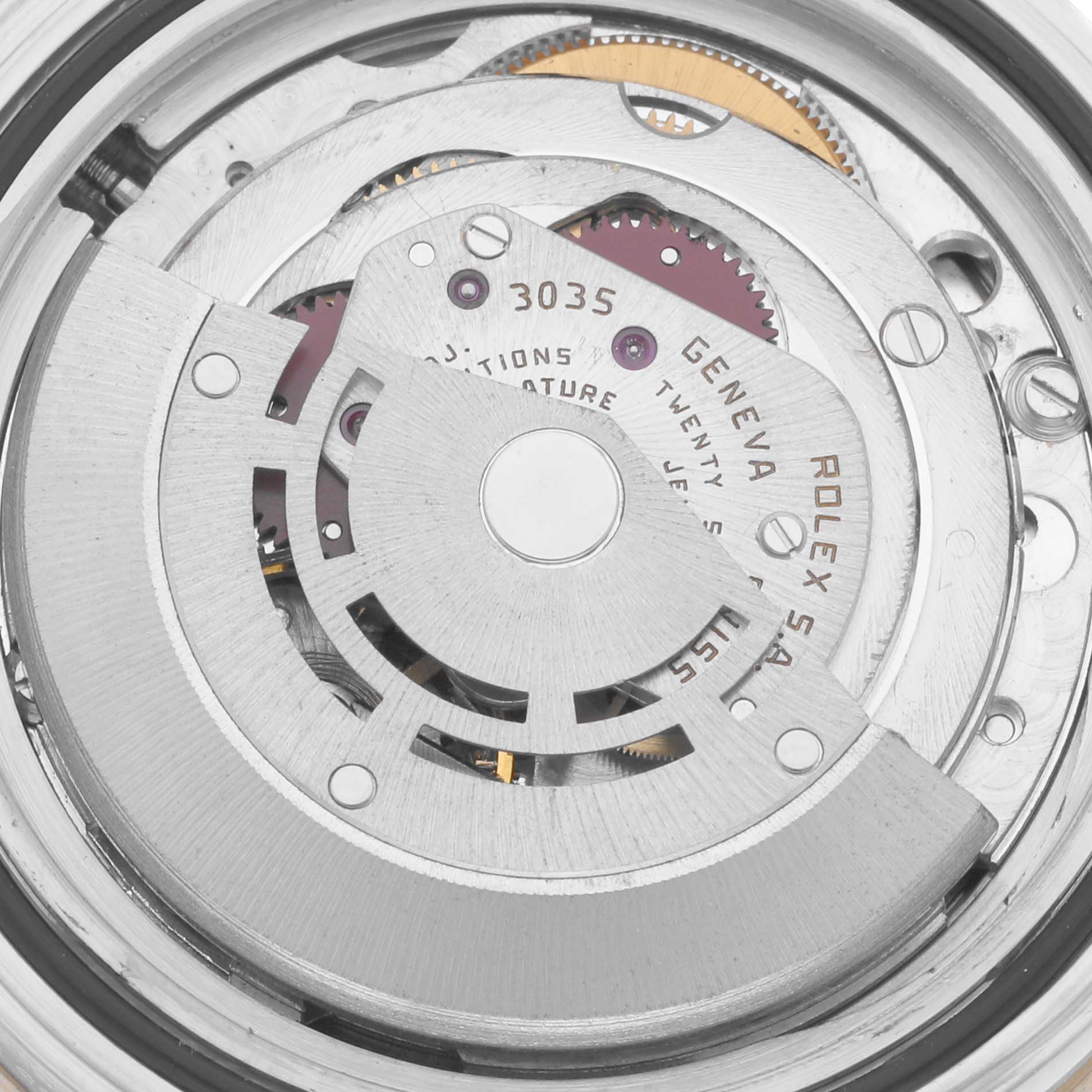 This is an image of the internal mechanism and movement of a Rolex Submariner 16803 Men's Steel and Gold (two tone) Black Dial 16803 Men's Steel and Gold (two tone) Black Dial watch, showing gears and the rotor.