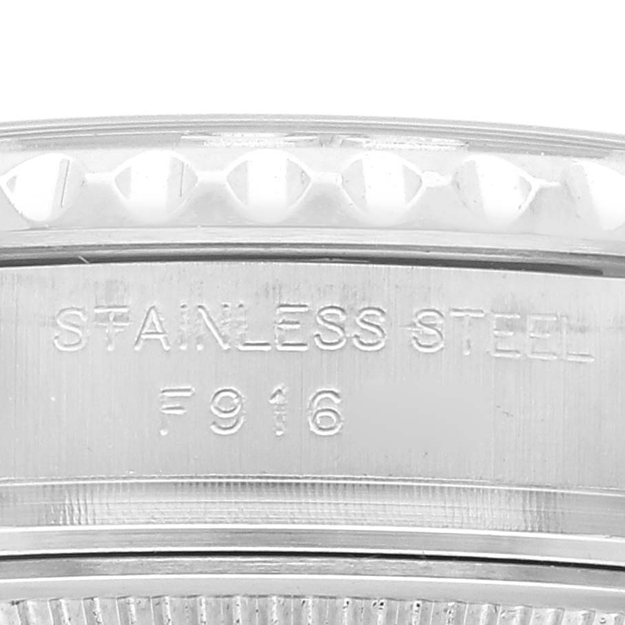 This image shows a close-up of the serial number and stainless steel engraving on the side of a Rolex Yacht-Master 169622 Women
s Stainless Steel Silver Dial 169622 Women
s Stainless Steel Silver Dial watch case.