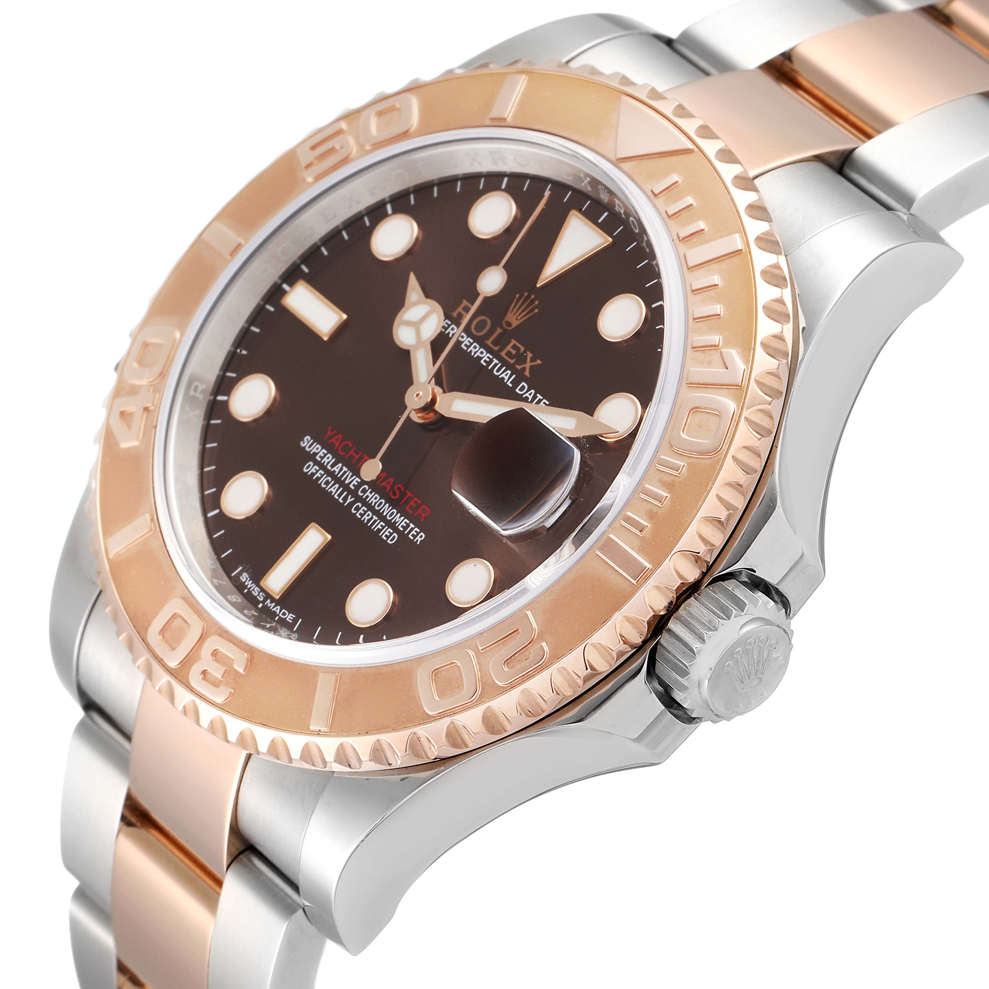 The Yacht-Master Rolex is shown from an angled view, highlighting its bezel, crown, and part of the bracelet.