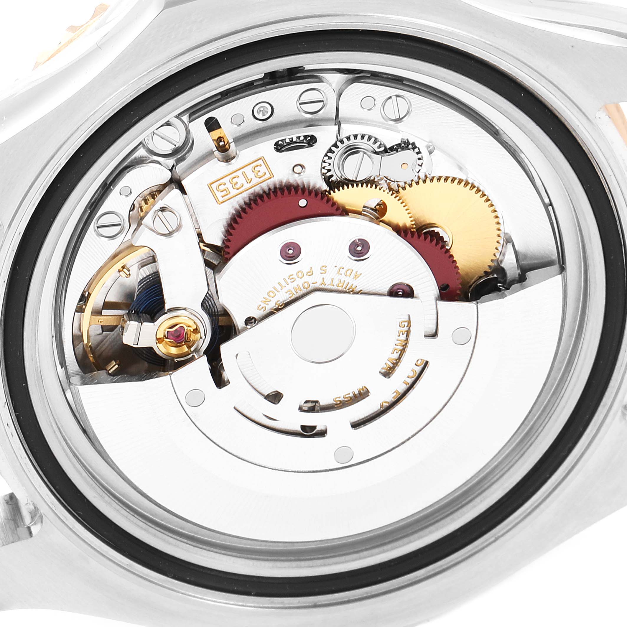 The image shows the intricate internal mechanism of the Rolex Yacht-Master 116621 Men's Steel and Gold (two tone) Brown Dial 116621 Men's Steel and Gold (two tone) Brown Dial watch from a close-up, top-down angle.