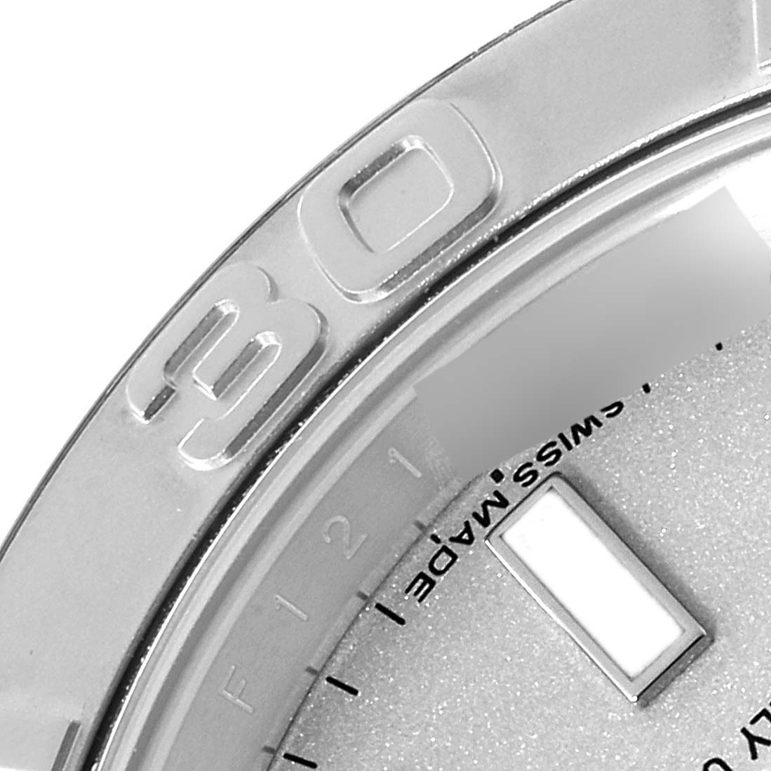 This close-up image shows the bezel and part of the dial of a Rolex Yacht-Master 116622 Men
s Stainless Steel Silver Dial 116622 Men
s Stainless Steel Silver Dial watch, highlighting the "30" marking.