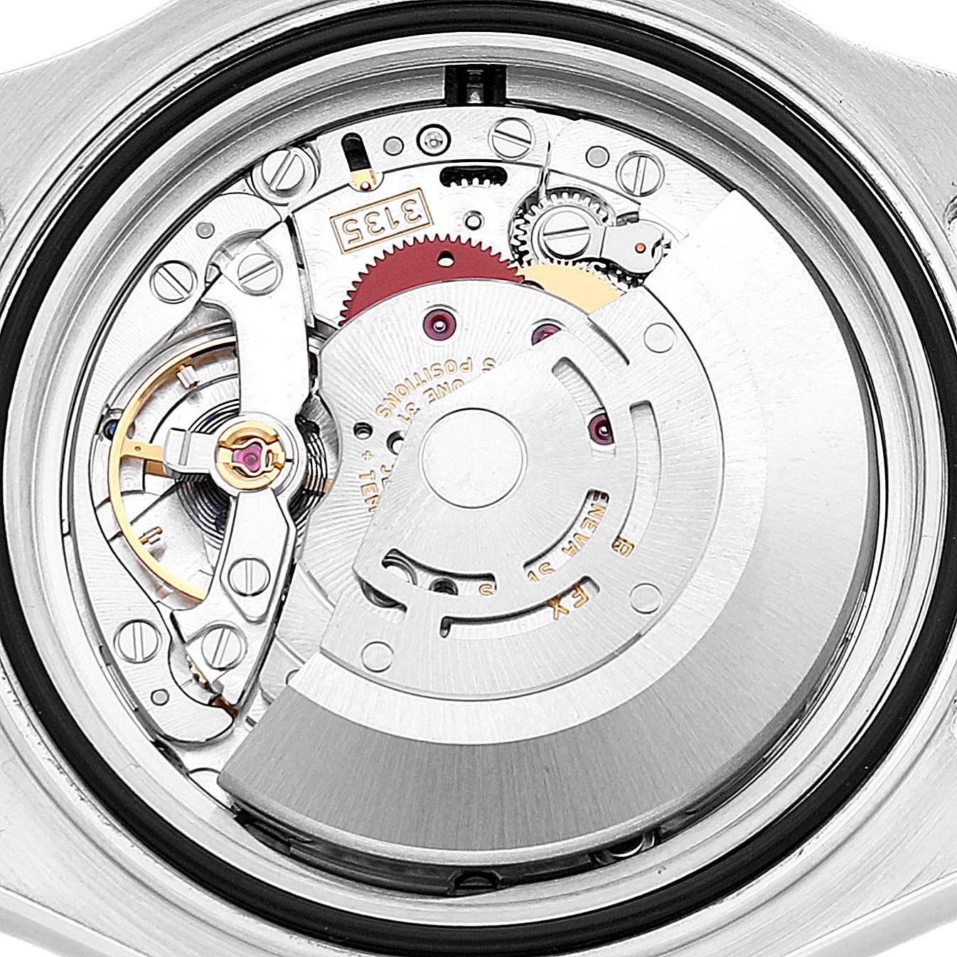 The image shows an internal view of the Rolex Yacht-Master 116622 Men
s Stainless Steel Silver Dial 116622 Men
s Stainless Steel Silver Dial
s movement and intricate mechanical parts.