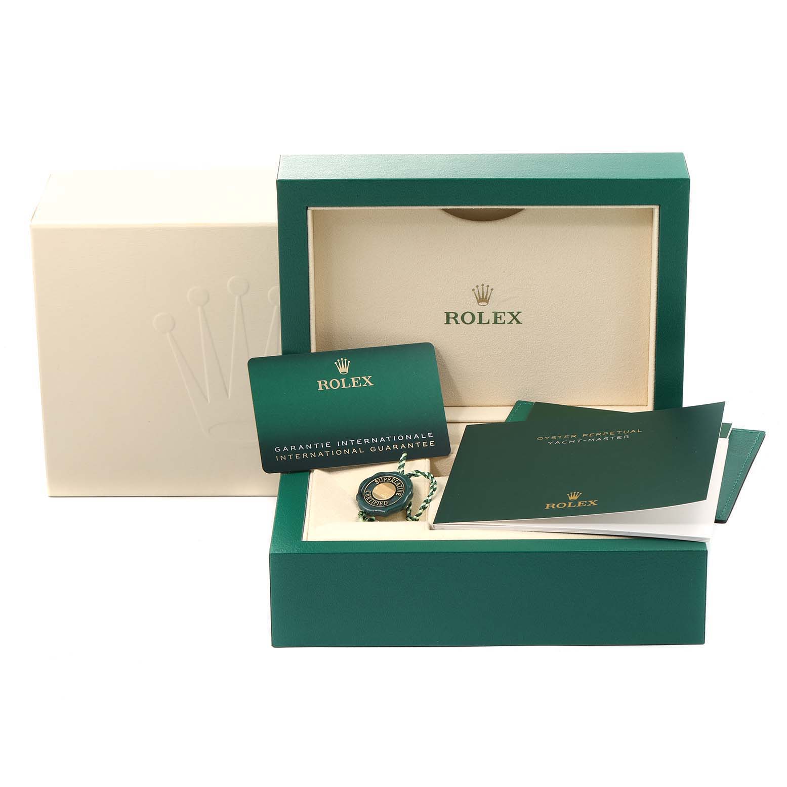 This image shows the packaging and accessories for a Rolex Yacht-Master 126622 Men
s Stainless Steel Blue Dial 126622 Men
s Stainless Steel Blue Dial watch, including the box, warranty card, and manuals.