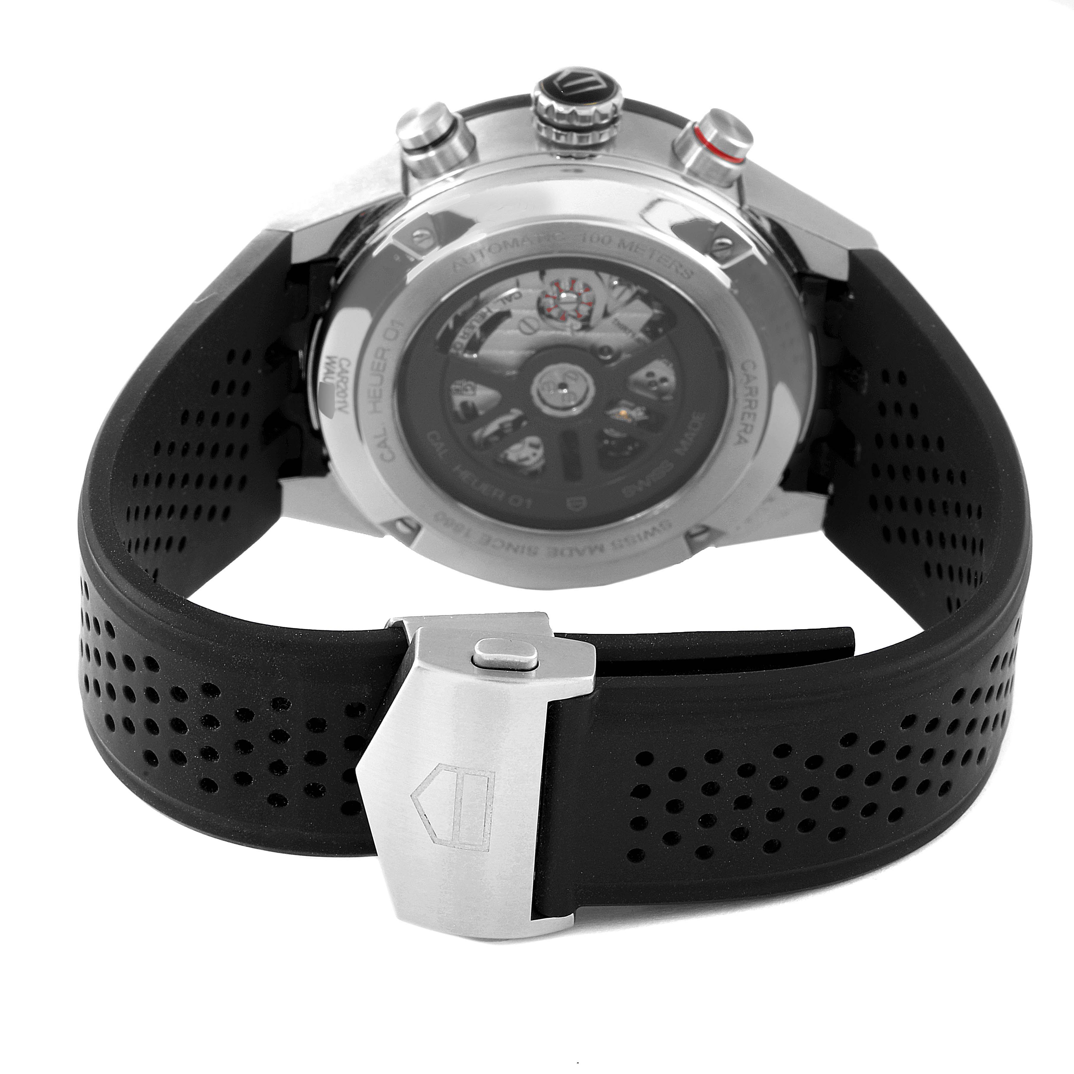 The image shows the back view of a Tag Heuer Carrera CAR201V.BA0714 Men's Stainless Steel Black Dial CAR201V.BA0714 Men's Stainless Steel Black Dial watch with a focus on its black rubber strap and stainless steel clasp.