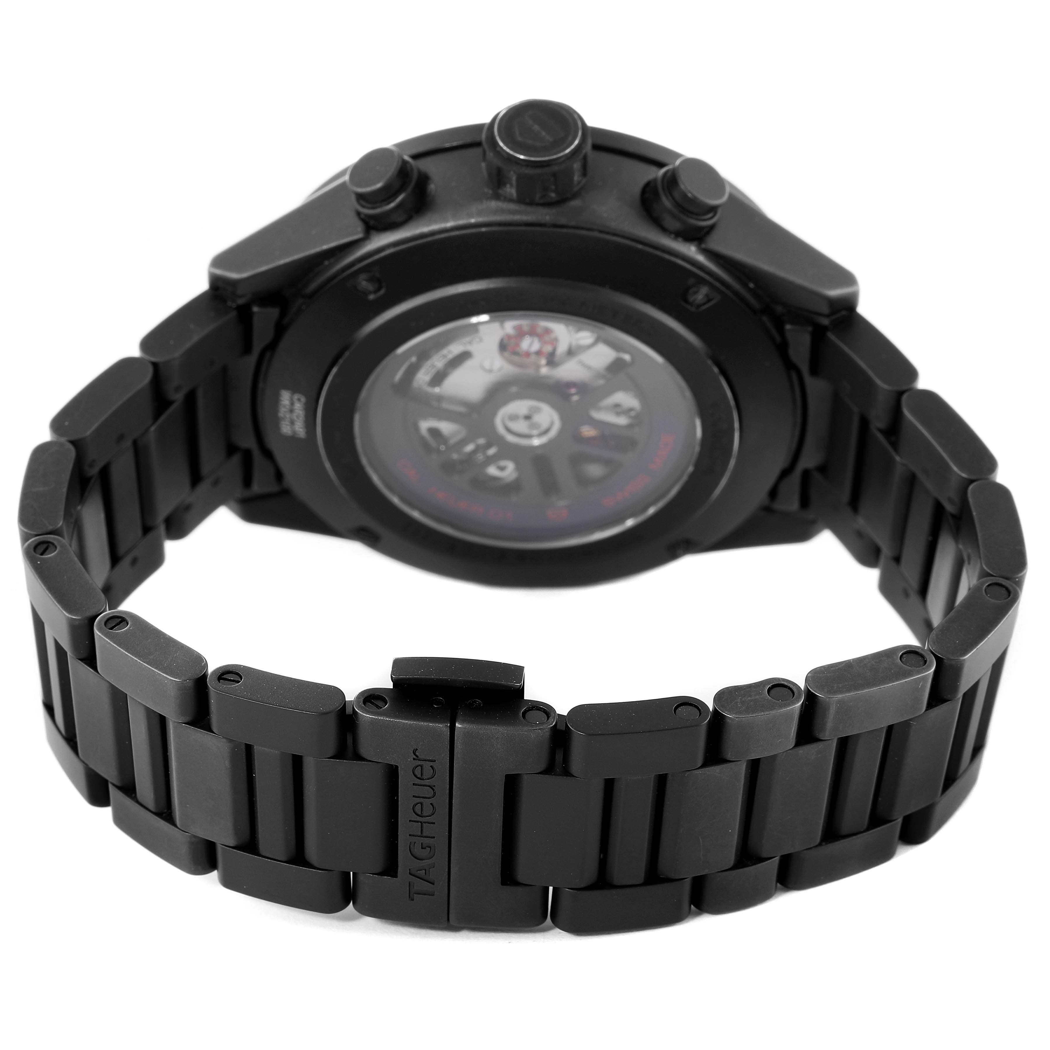 The image shows the back view of a Tag Heuer Carrera CAR2A91.BH0742 Men's Ceramic Black Dial CAR2A91.BH0742 Men's Ceramic Black Dial watch, highlighting its strap, clasp, and case back.