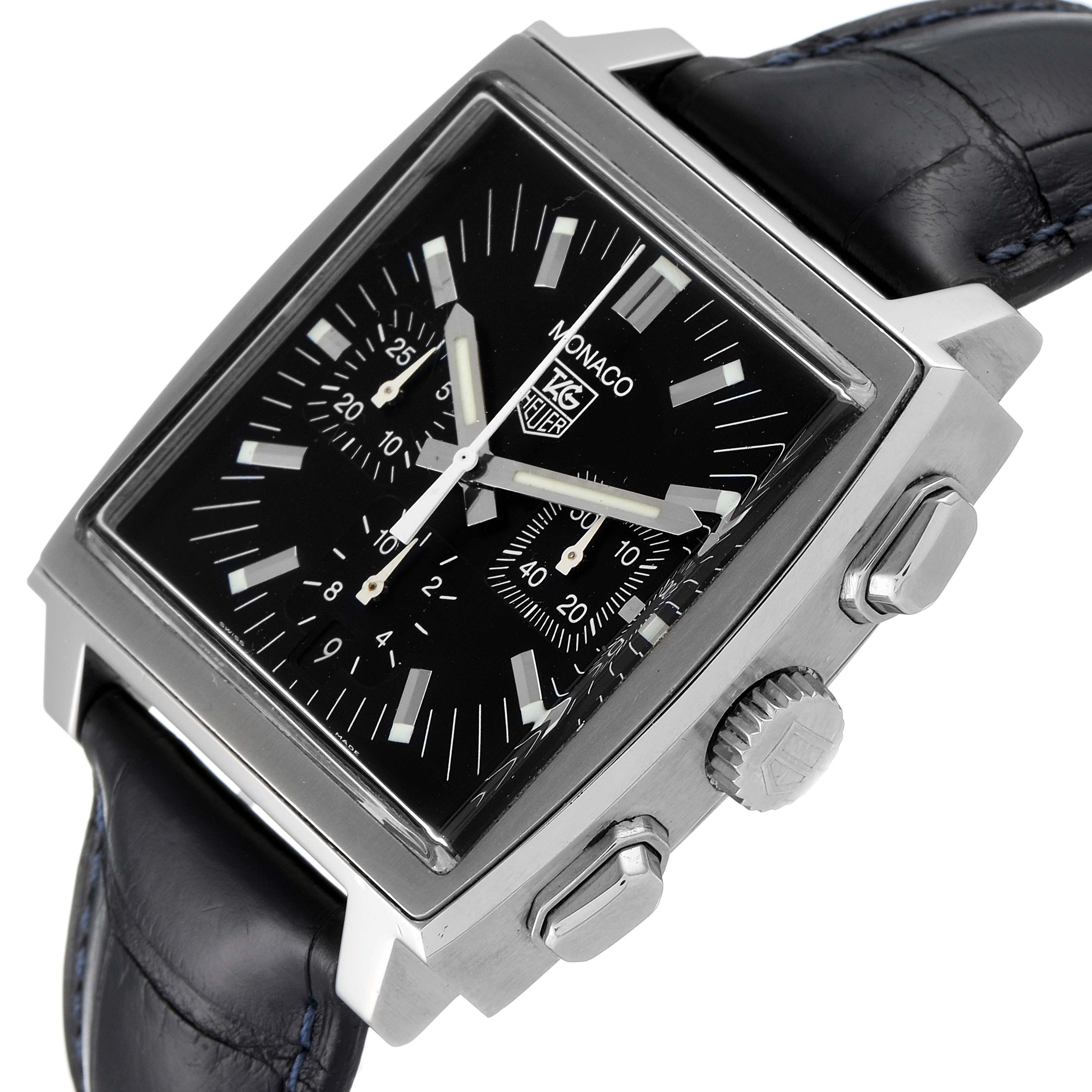 This image shows a close-up, angled view of the face, case, crown, and strap of a Tag Heuer Monaco CW2111 Men's Stainless Steel Black Dial CW2111 Men's Stainless Steel Black Dial watch.