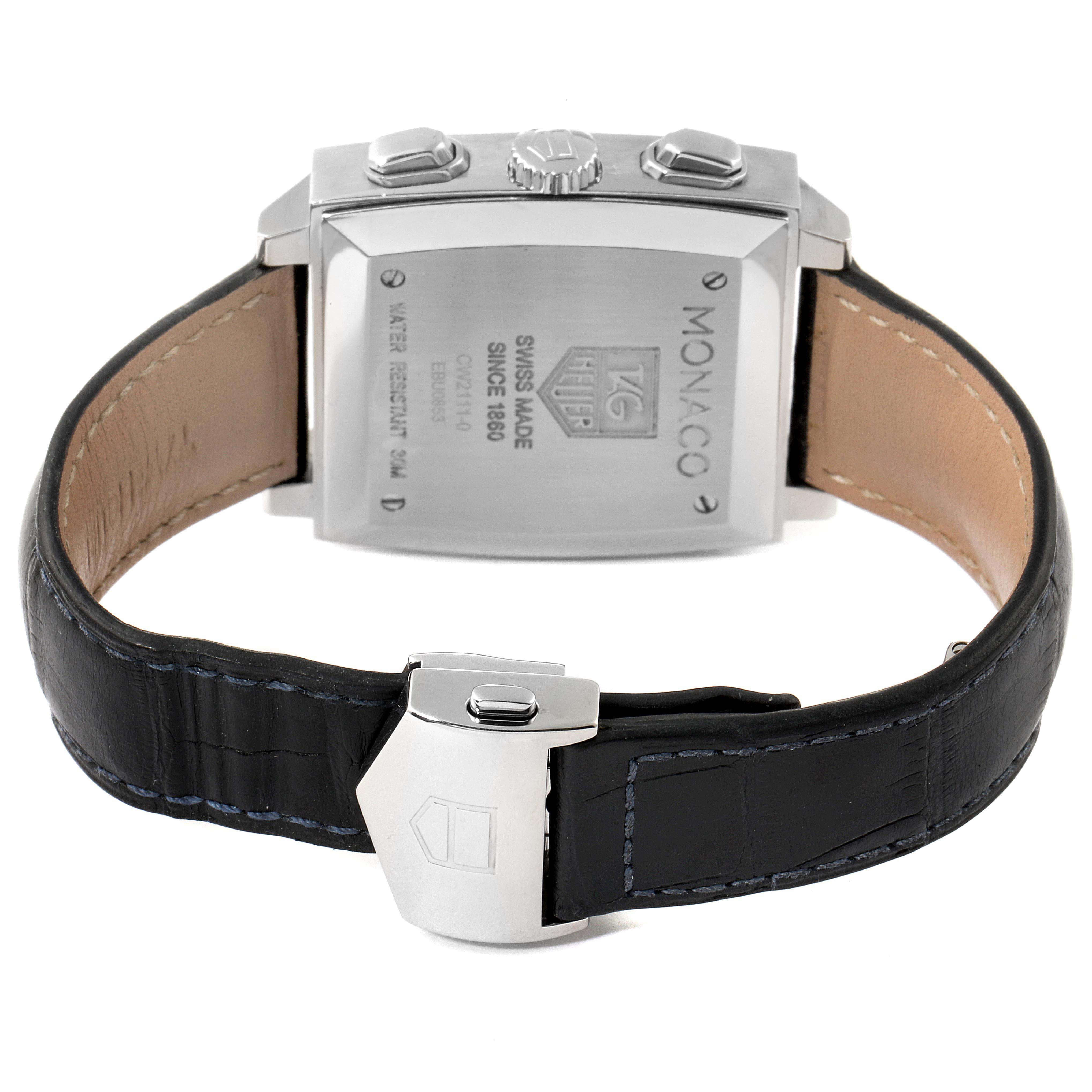The image shows the back view of the Tag Heuer Monaco CW2111 Men's Stainless Steel Black Dial CW2111 Men's Stainless Steel Black Dial watch, displaying the case back, lugs, and leather strap with a clasp.