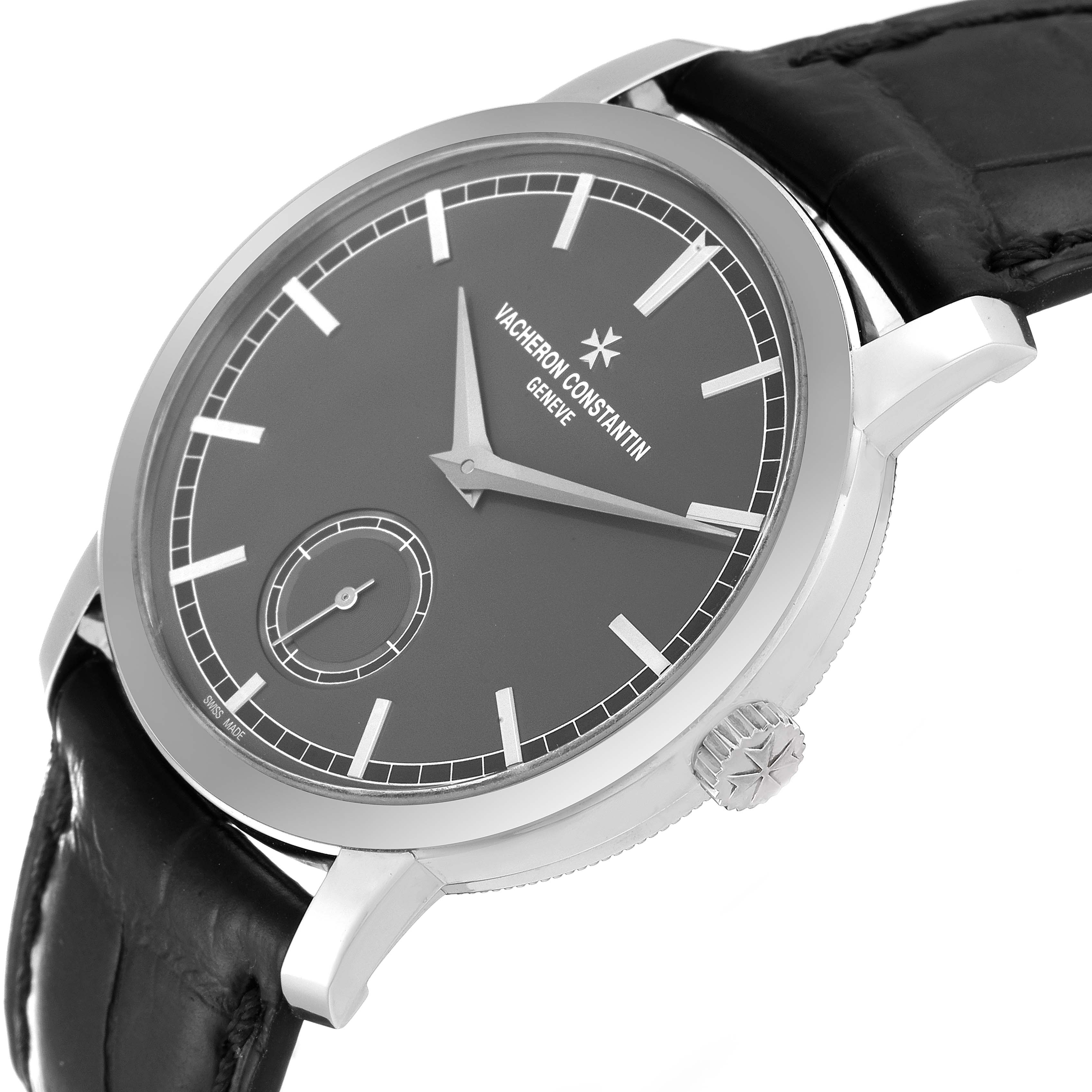 The image shows a close-up of the dial, bezel, crown, and part of the strap of a Vacheron Constantin Traditionnelle 82172/000P-9811 Men's Platinum Grey Dial 82172/000P-9811 Men's Platinum Grey Dial watch.
