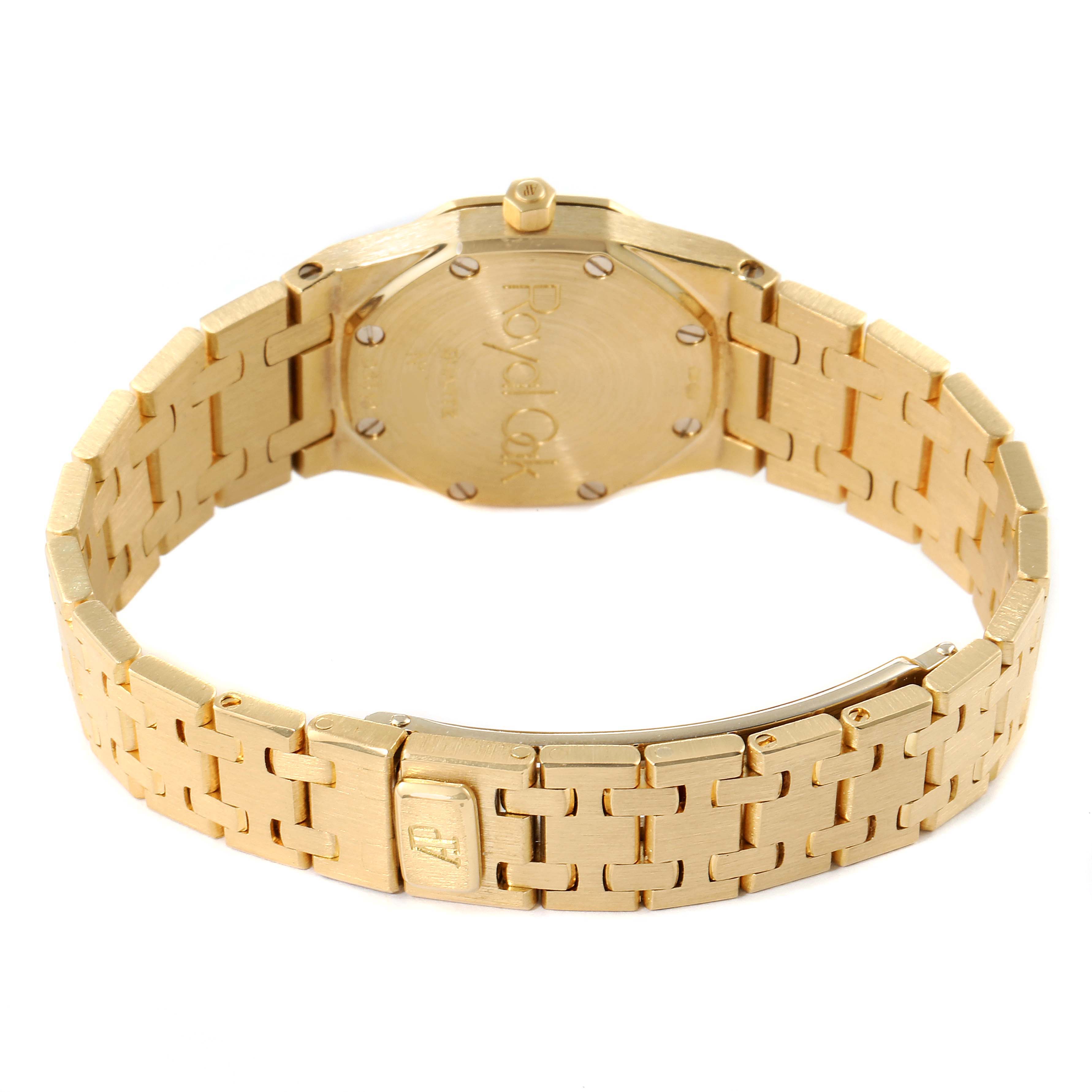 The image shows the back view of an Audemars Piguet Royal Oak D6519 Women's Yellow Gold Champagne Dial D6519 Women's Yellow Gold Champagne Dial watch, highlighting its case back, bracelet, and clasp.