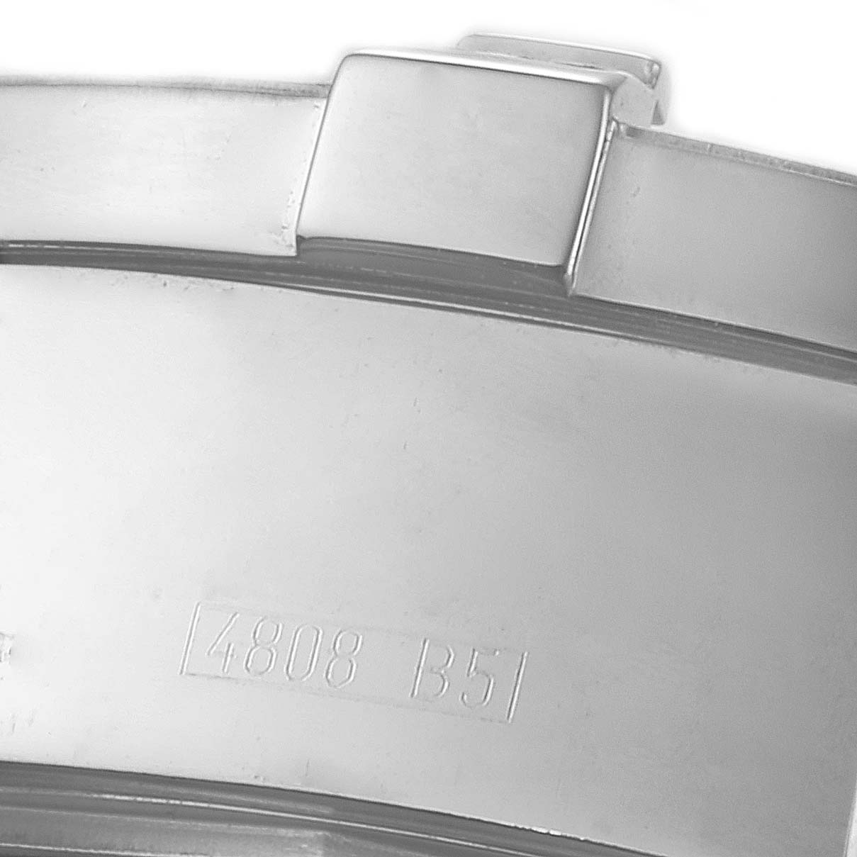 The image shows a close-up of the bezel and engraved serial number of a Breitling Superocean A13340 Men's Stainless Steel Black Dial A13340 Men's Stainless Steel Black Dial watch.