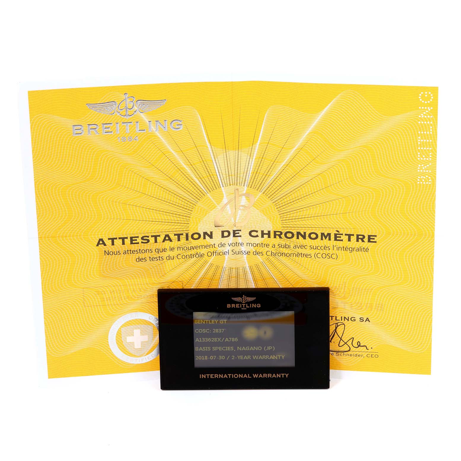 The image shows the Breitling Bentley A13362 Men's Stainless Steel Mother of Pearl Dial A13362 Men's Stainless Steel Mother of Pearl Dial watch's certificate of authenticity and international warranty card.