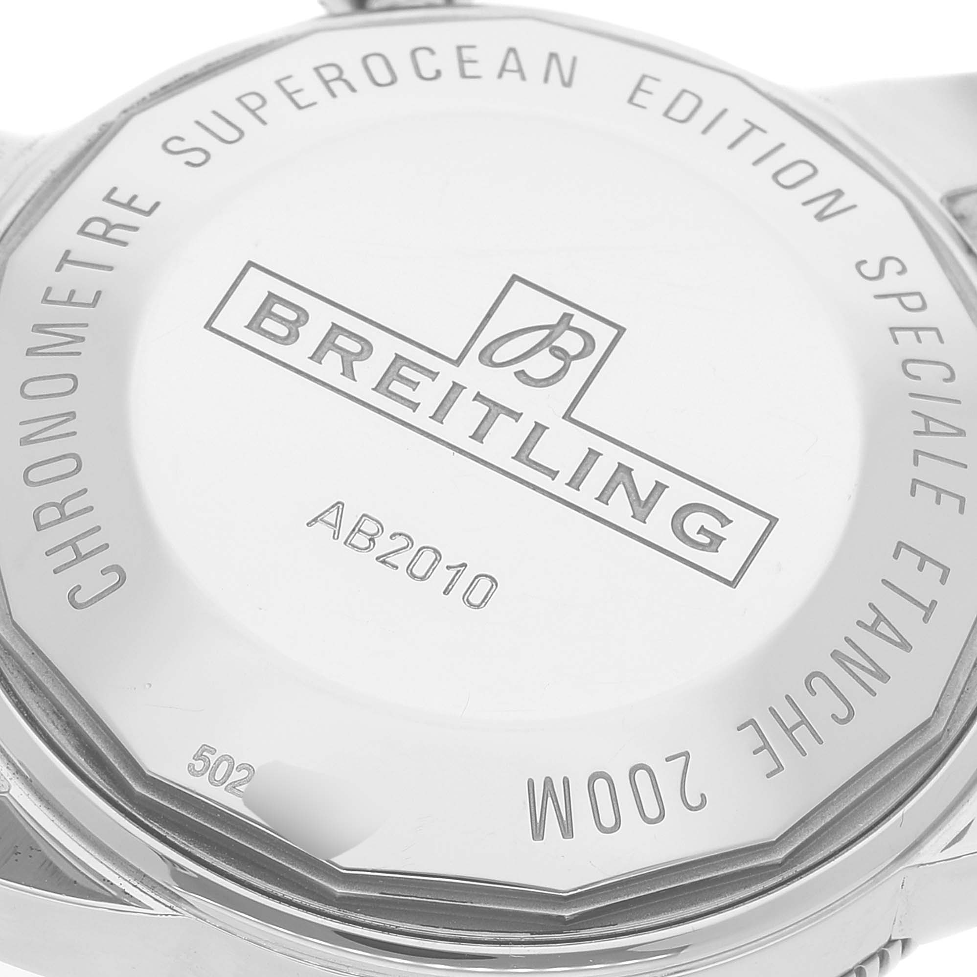The image shows the back case of a Breitling Superocean AB2010 Men's Stainless Steel Brown Dial AB2010 Men's Stainless Steel Brown Dial model watch, showcasing the engraved details.