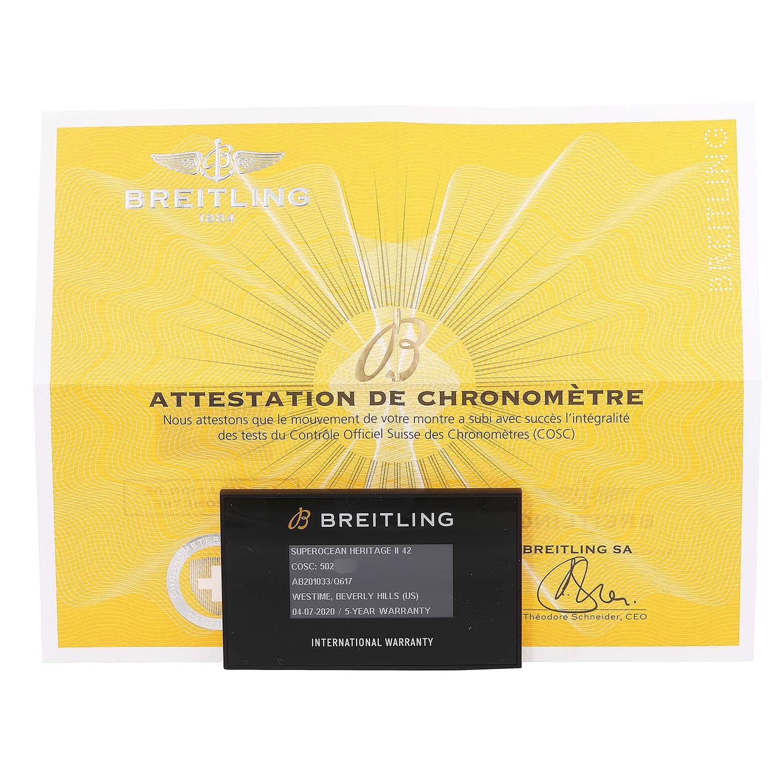 This image shows the warranty card and chronometer certification for a Breitling Superocean AB2010 Men's Stainless Steel Brown Dial AB2010 Men's Stainless Steel Brown Dial model watch.