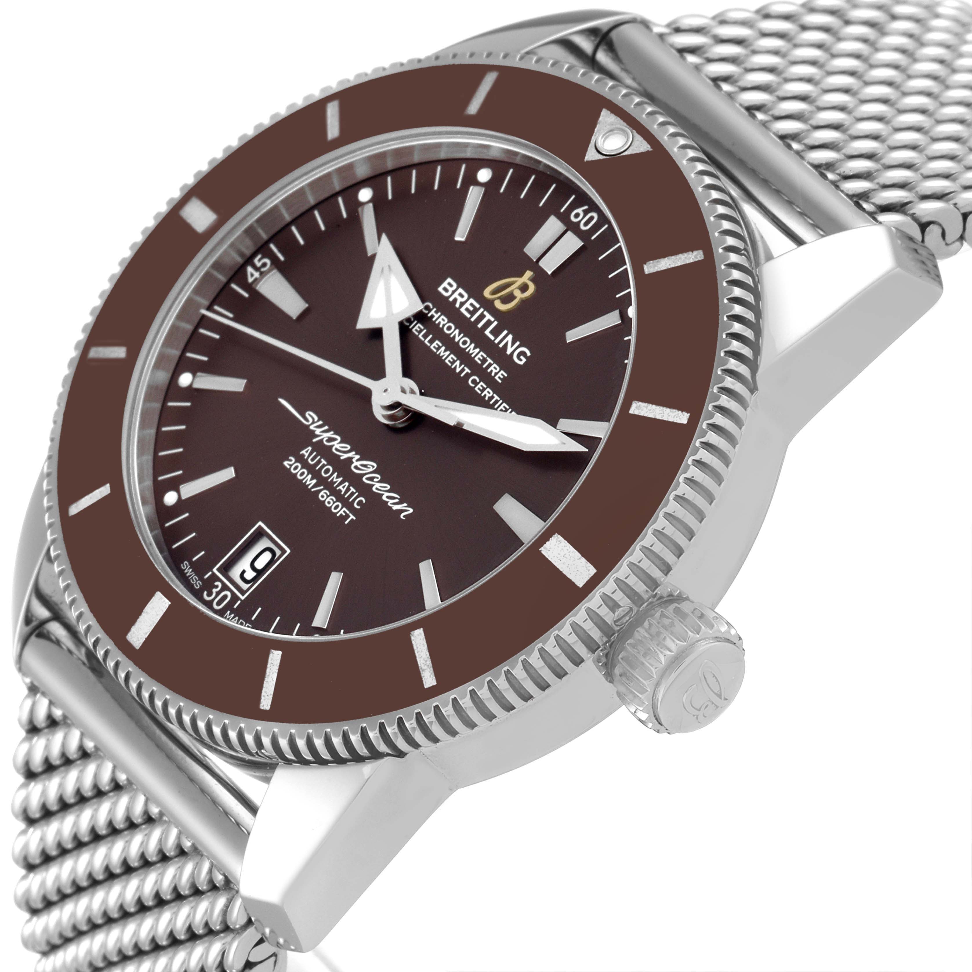 The image shows a close-up angle of the Breitling Superocean AB2010 Men's Stainless Steel Brown Dial AB2010 Men's Stainless Steel Brown Dial watch, displaying the dial, bezel, crown, and a portion of the metal mesh bracelet.