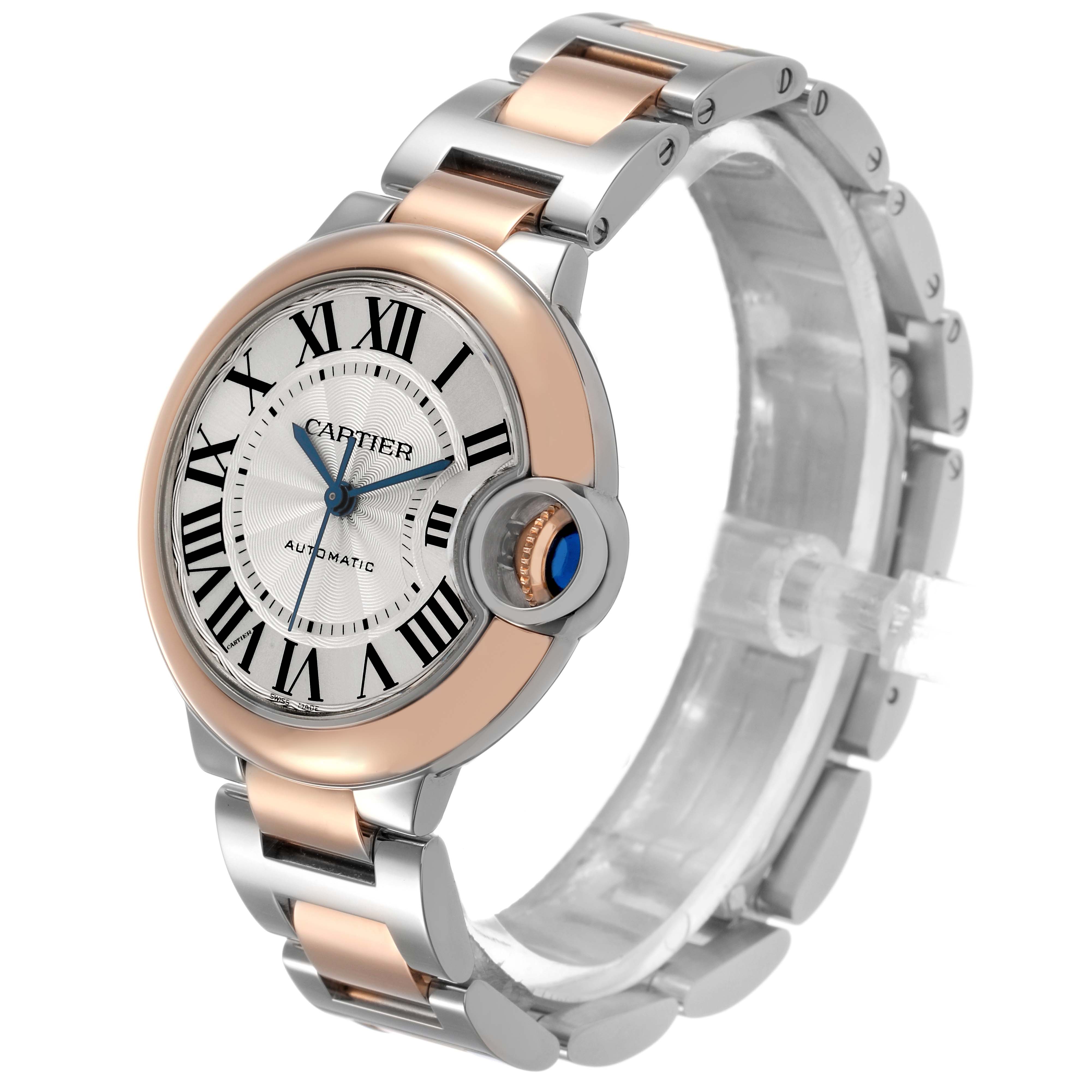 The Cartier Ballon Bleu W2BB0023 Women's Stainless Steel Silver Dial watch is shown at an angled side view, highlighting its face, crown, and two-tone metal bracelet.