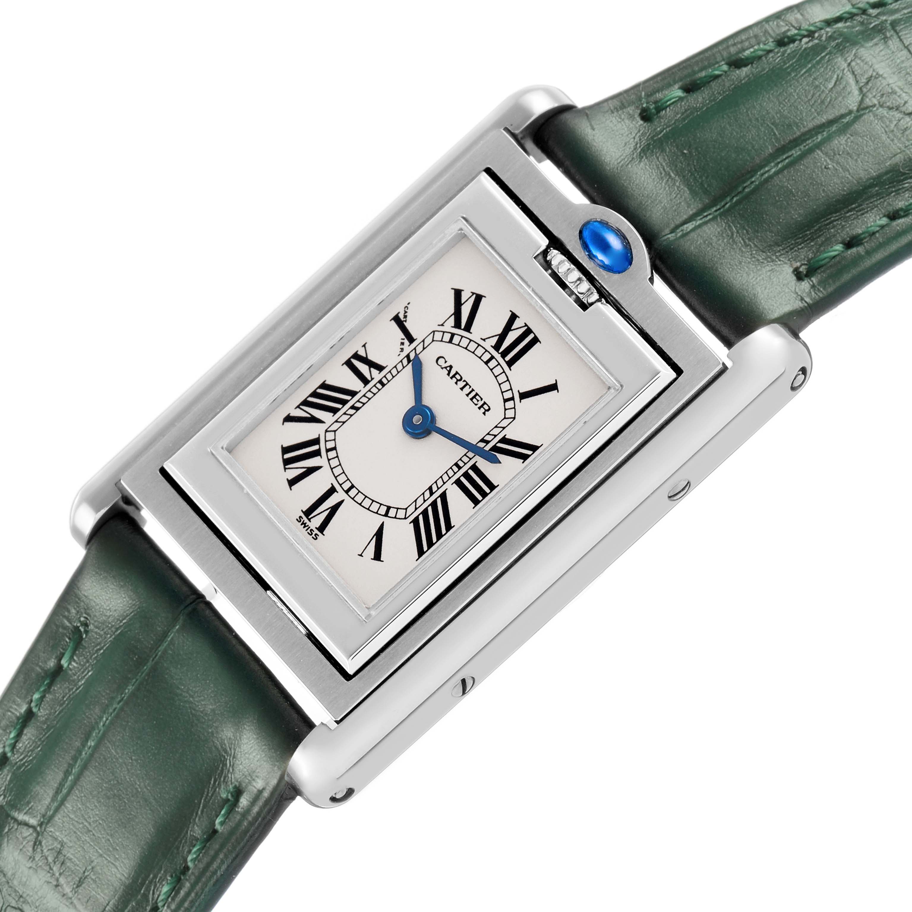 The Cartier Tank Basculante W1011158 Women's Stainless Steel Silver Dial watch is shown at an angle, highlighting its dial, case, and green leather strap.