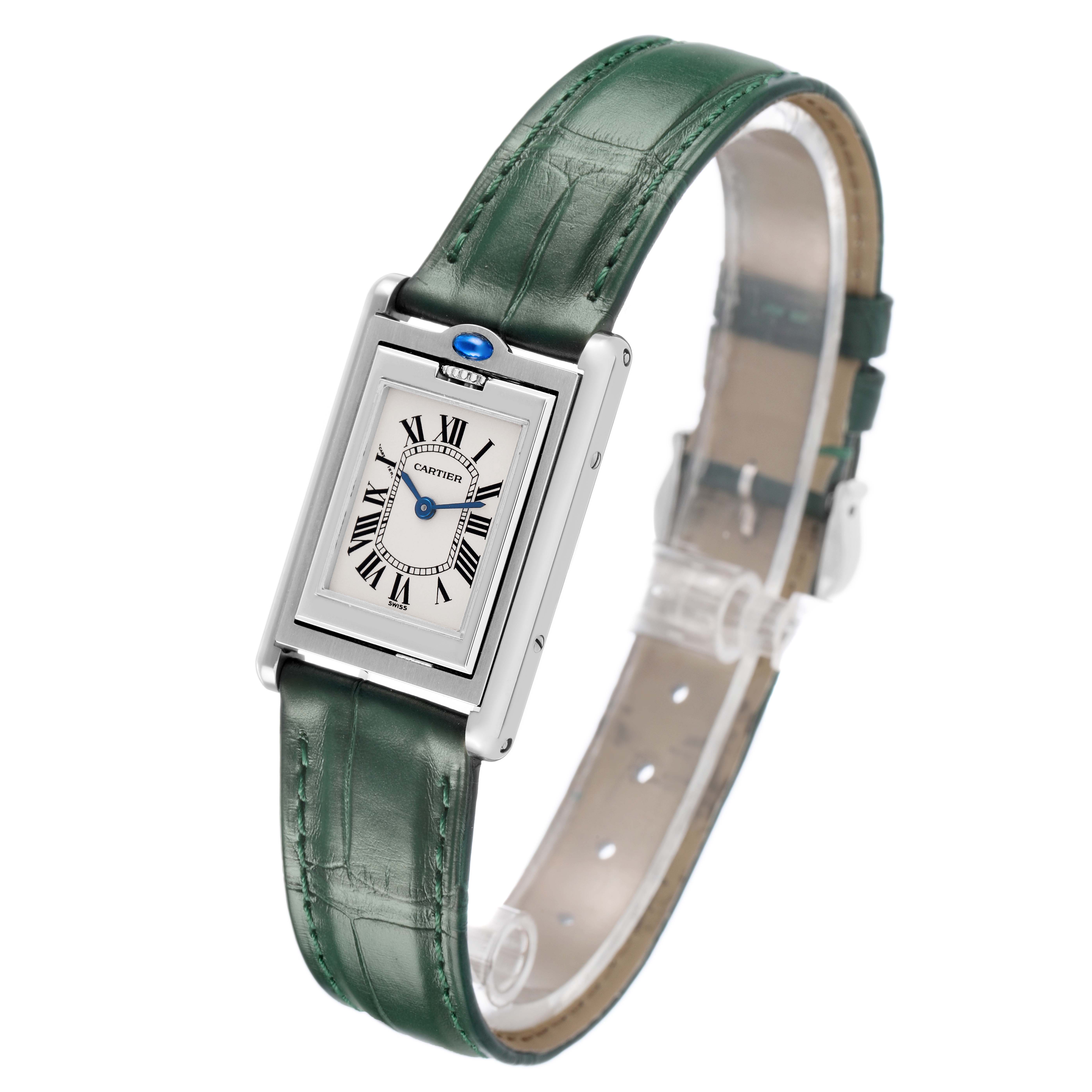 The Cartier Tank Basculante W1011158 Women's Stainless Steel Silver Dial watch is shown at a front angle, highlighting its face, case, and green leather strap.