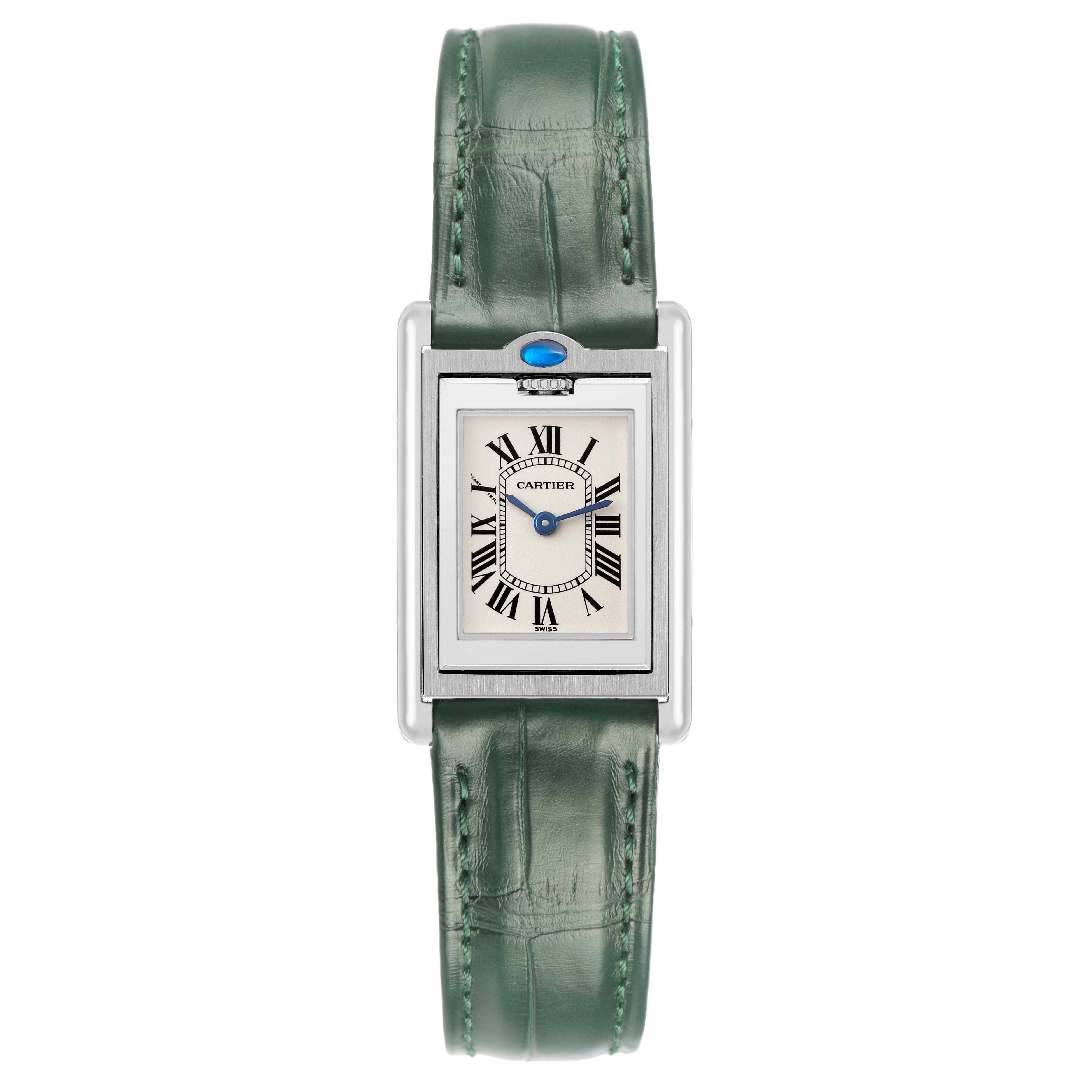 The image shows a frontal view of the Cartier Tank Basculante W1011158 Women's Stainless Steel Silver Dial, featuring its dial and green leather strap.