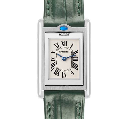 The Cartier Tank Basculante W1011158 Women's Stainless Steel Silver Dial watch is shown from the front, featuring its rectangular face and green leather strap.