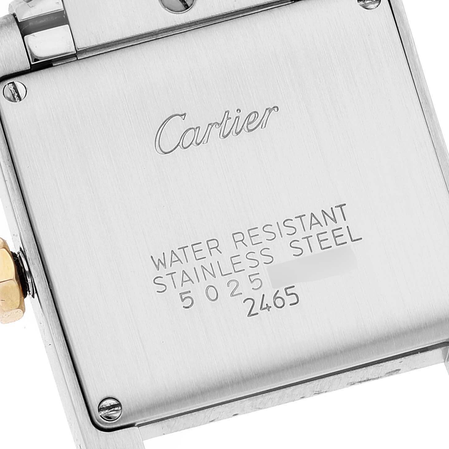 The image shows the back view of a Cartier Tank Française watch, displaying its engraved specifications.