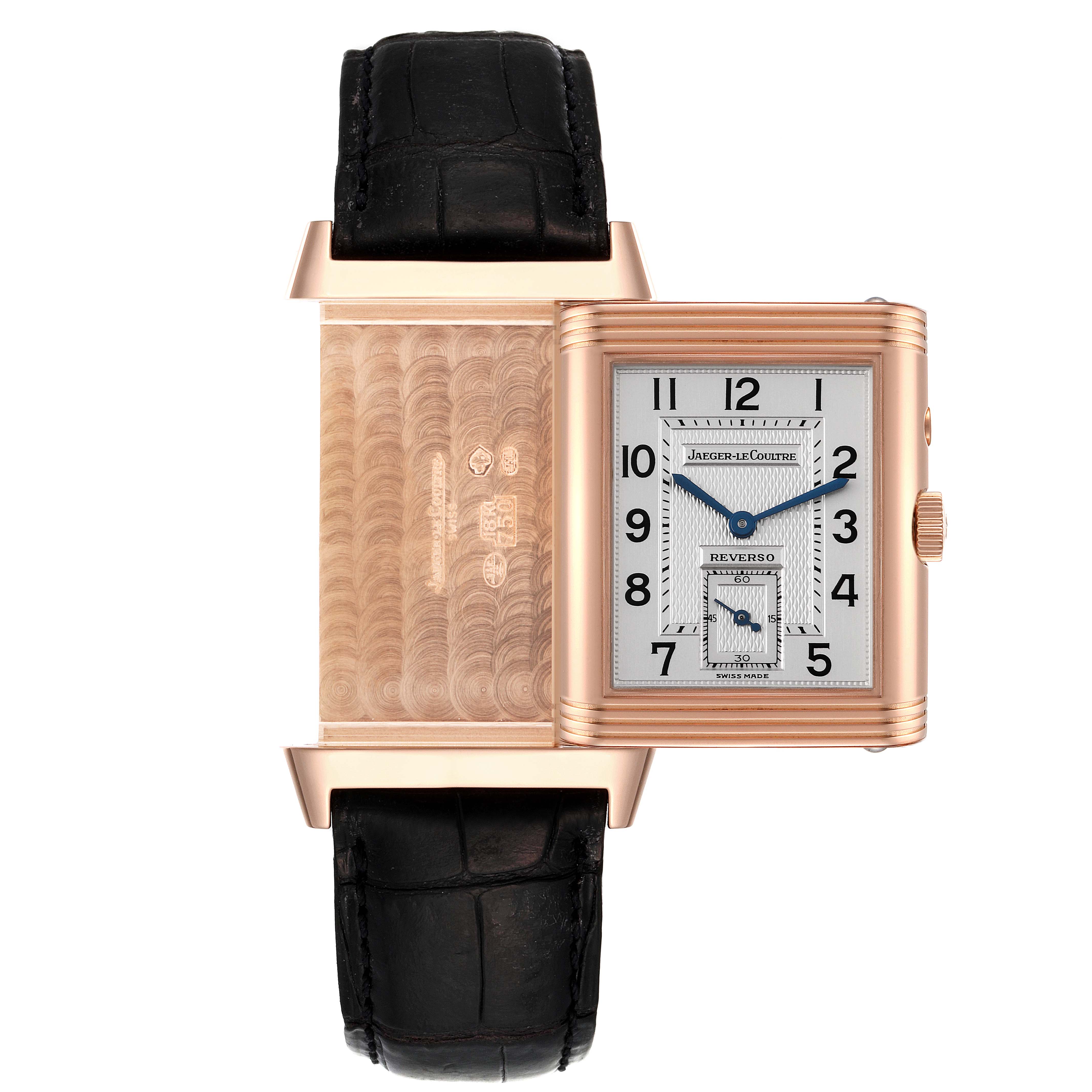 The image shows the Jaeger LeCoultre Reverso Q270254 Men
s Rose Gold Silver Dial Q270254 Men
s Rose Gold Silver Dial watch from a front angle with its case flipped to reveal the decorated back.