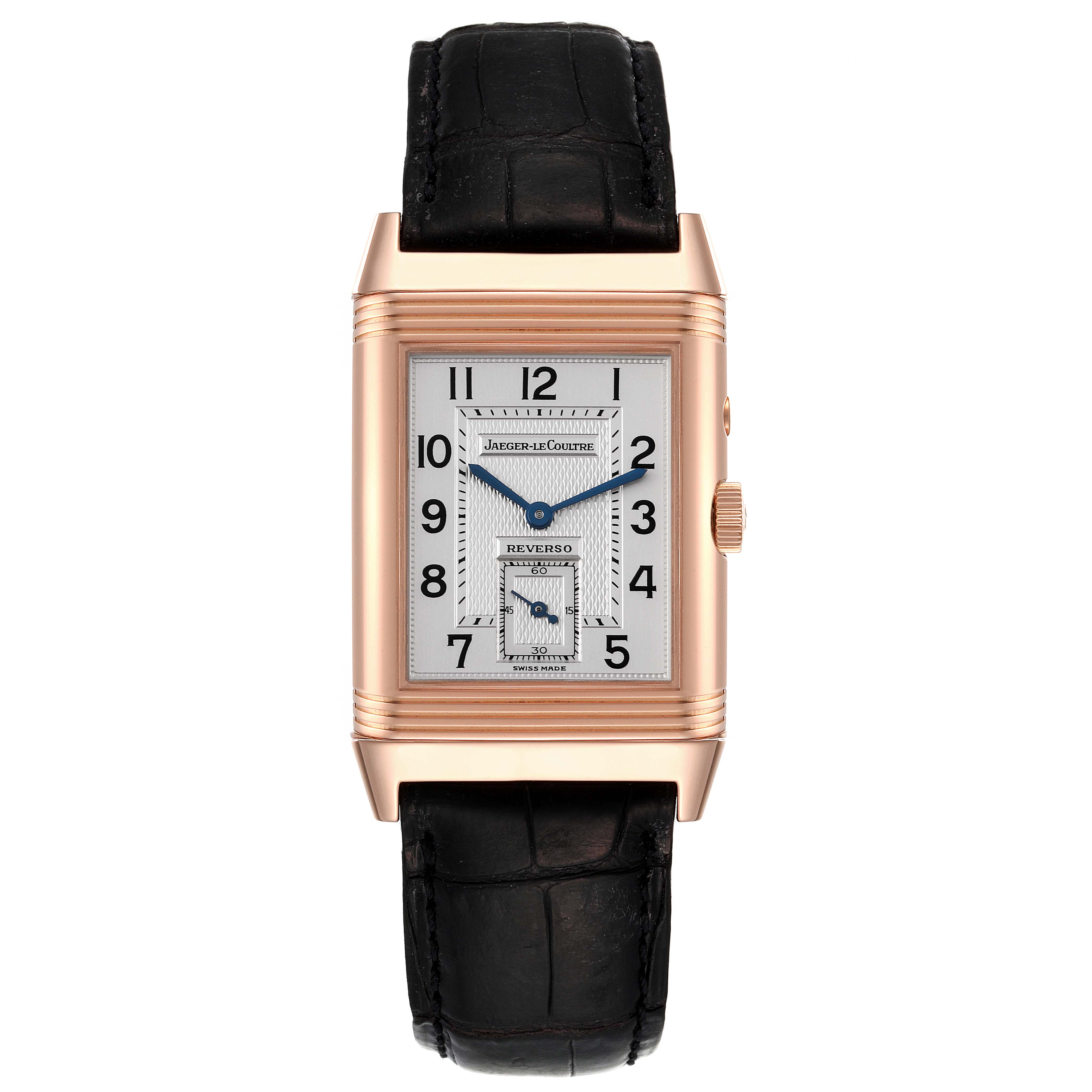 The image shows a front view of the Jaeger-LeCoultre Reverso watch, highlighting its rectangular dial and black leather strap.