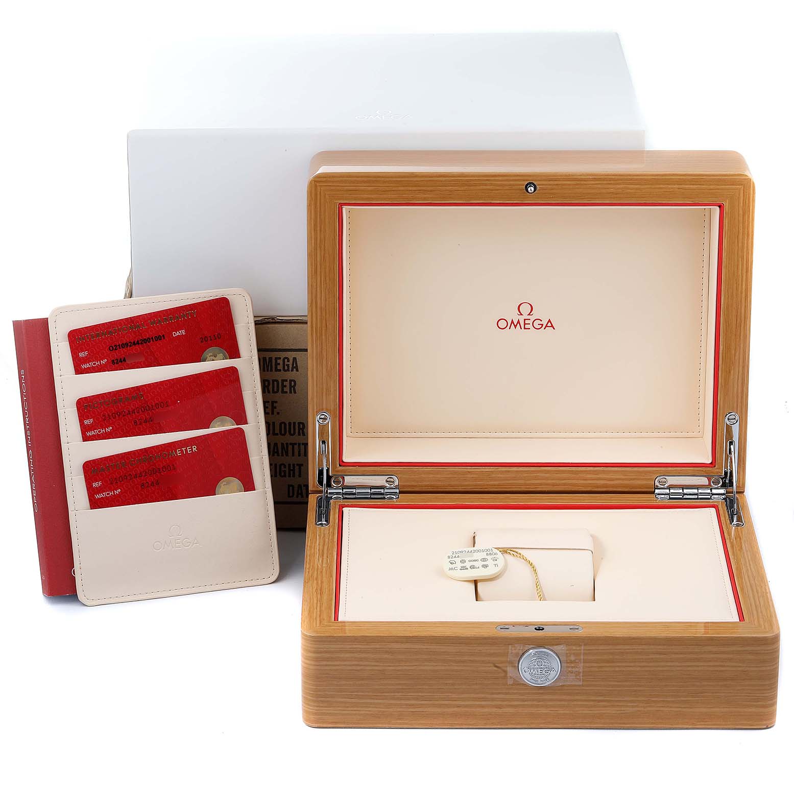 The image shows an Omega Seamaster 210.92.44.20.01.001 Men's Ceramic Black Dial 210.92.44.20.01.001 Men's Ceramic Black Dial watch box, warranty cards in a holder, and a tag, all neatly presented.