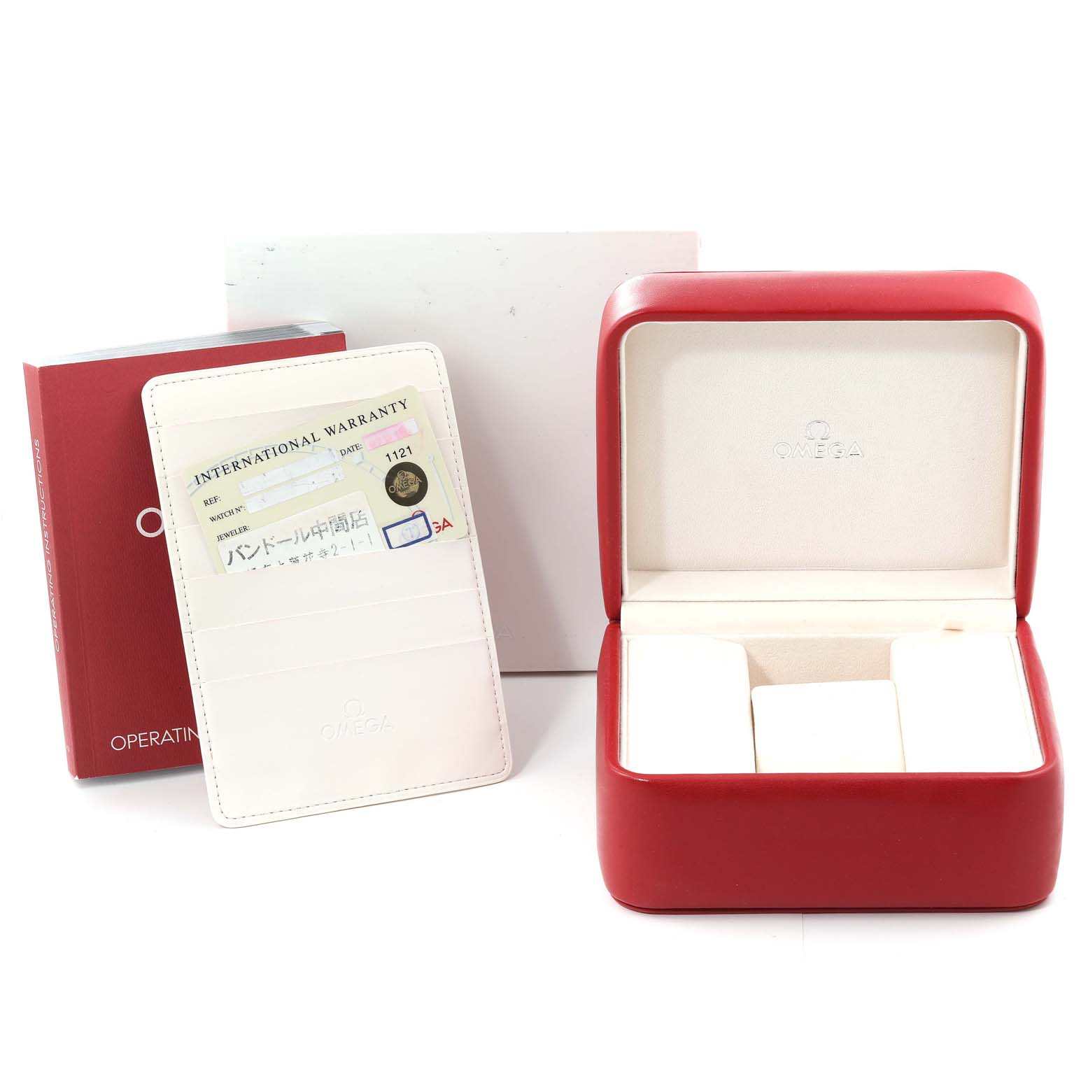 The image shows the Omega Speedmaster 3513.33.00 Men's Stainless Steel Silver Dial 3513.33.00 Men's Stainless Steel Silver Dial's watch box, an international warranty card, and an operating instructions booklet.