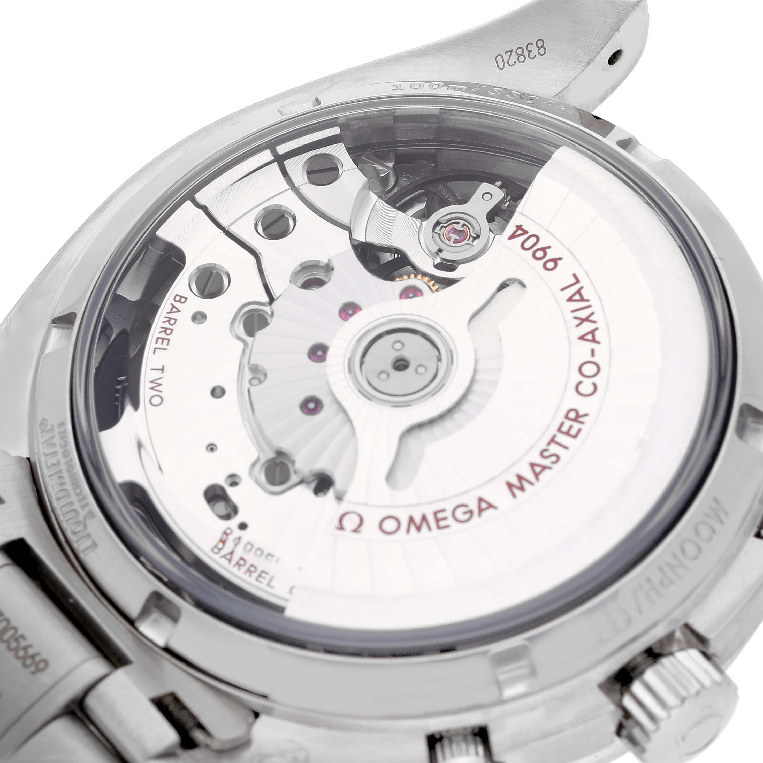 The image shows the back view of an Omega Speedmaster 304.30.44.52.01.001 Men
s Stainless Steel Black Dial 304.30.44.52.01.001 Men
s Stainless Steel Black Dial watch, highlighting its intricate movement mechanics.