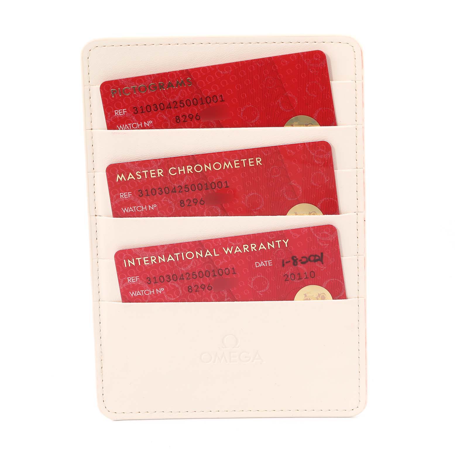 This image shows three red cards for the Omega Speedmaster 310.30.42.50.01.001 Men
s Stainless Steel Black Dial 310.30.42.50.01.001 Men
s Stainless Steel Black Dial watch, including a pictogram, master chronometer, and international warranty card.