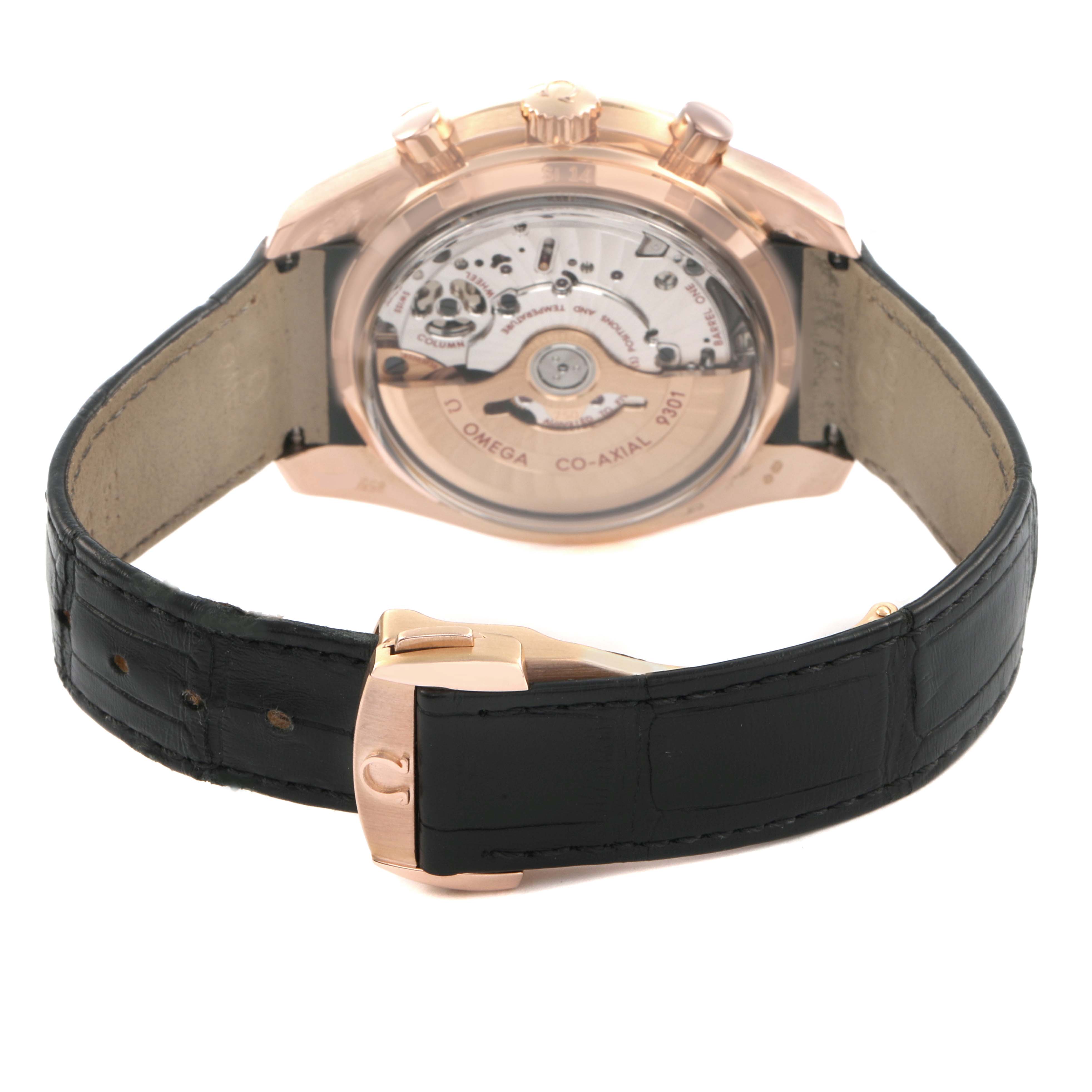 The Omega Speedmaster 311.63.44.51.01.001 Men's Rose Gold Black Dial is shown from the back, highlighting the case back and movement, with a visible leather strap.