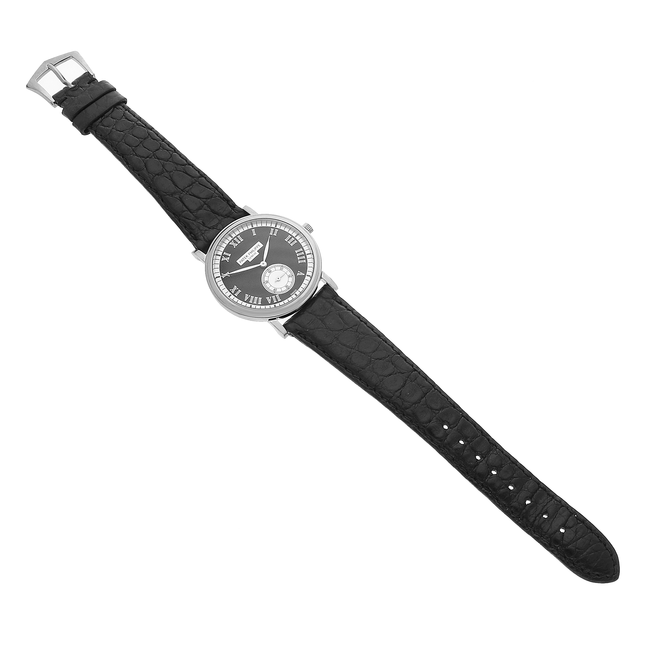 The Patek Philippe Calatrava 5022G Men's White Gold Black Dial watch is shown from a top view, displaying the face, hands, and leather strap.