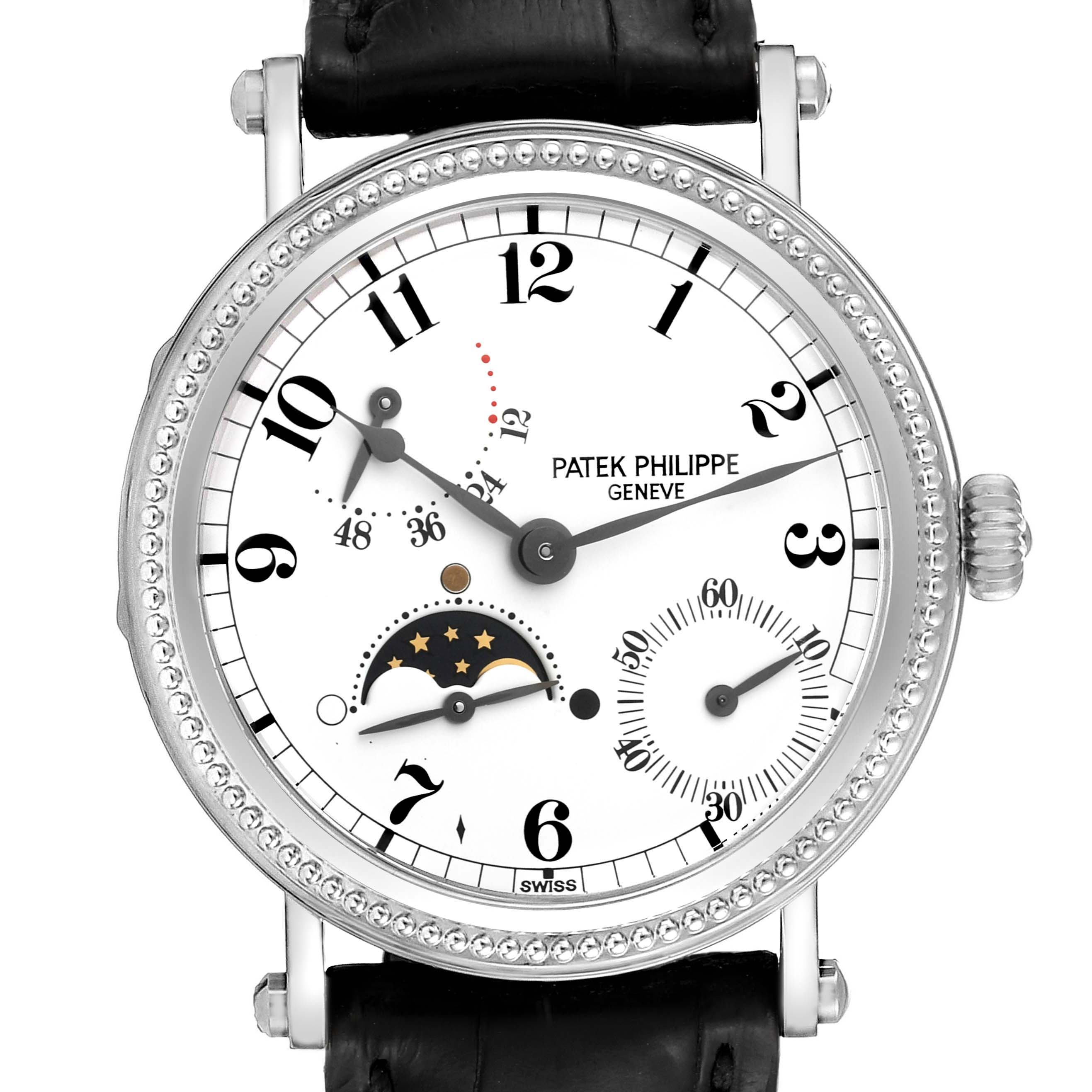 The image shows the face of a Patek Philippe Complications 5015G-001 Men's White Gold White Dial 5015G-001 Men's White Gold White Dial model watch, displaying multiple dials and a moon phase indicator.