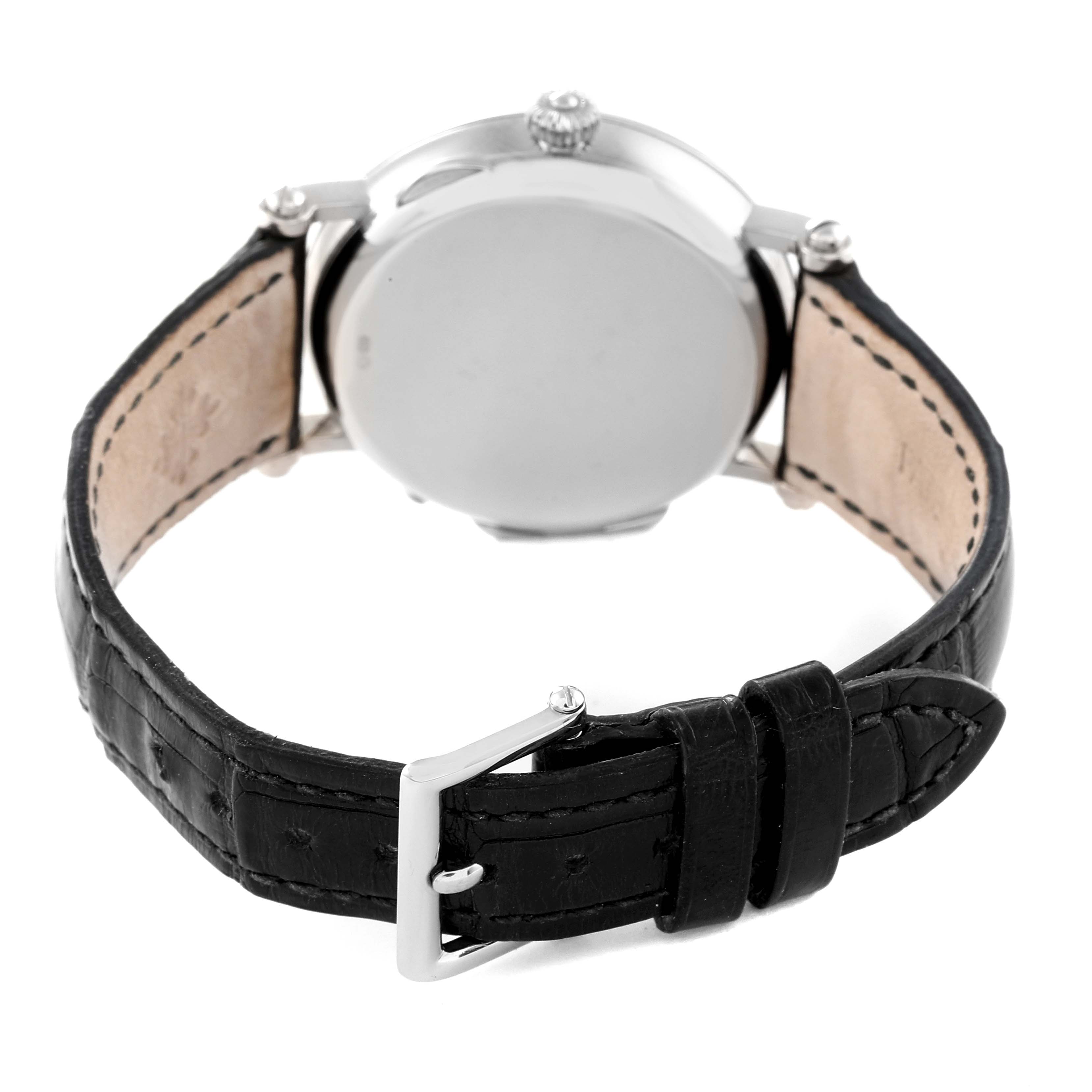 The image shows the back case and leather strap of a Patek Philippe Complications 5015G-001 Men's White Gold White Dial 5015G-001 Men's White Gold White Dial model watch from a rear angle.