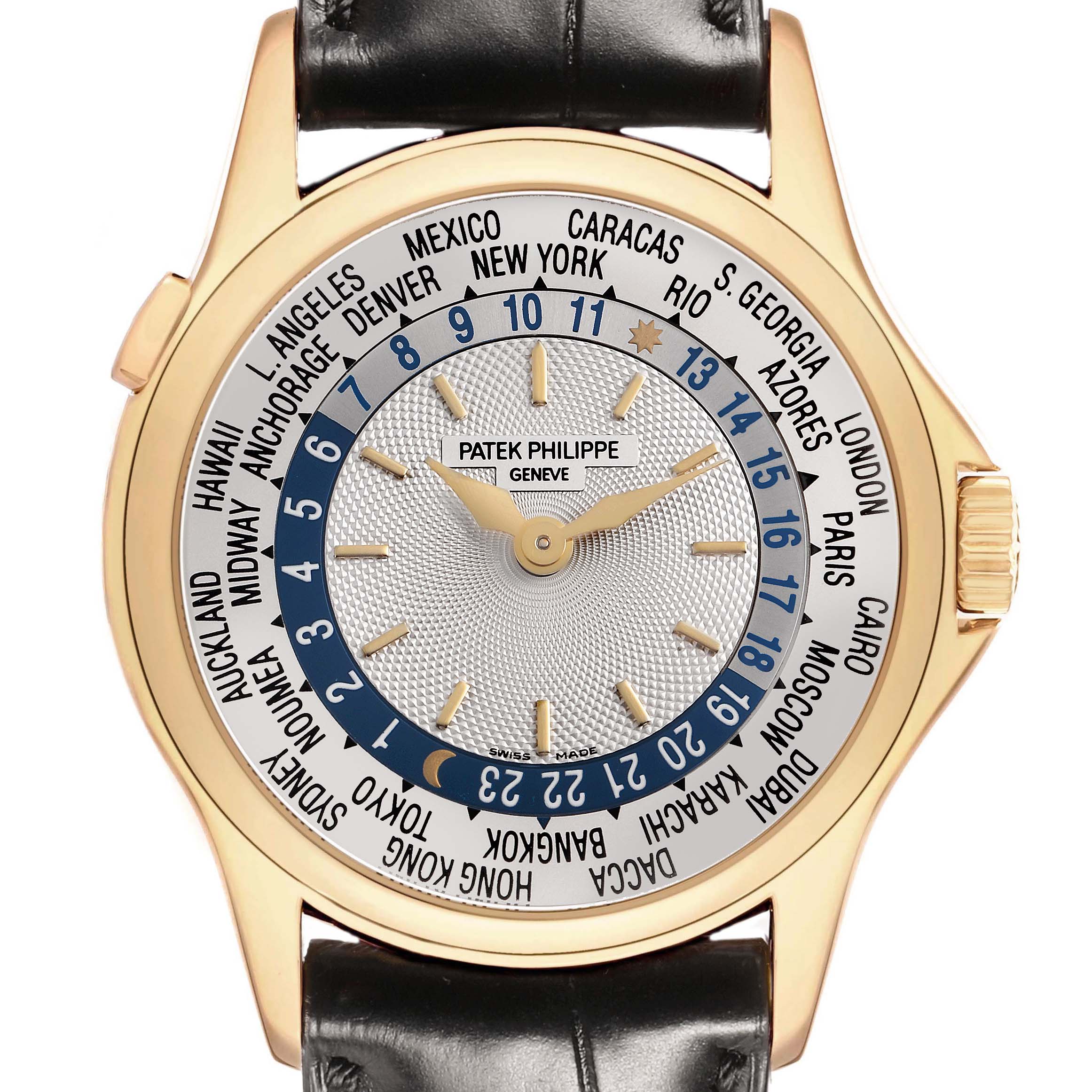 The Patek Philippe Complications 5110J-001 Men's Yellow Gold Silver Dial watch is shown from a front angle, highlighting its world time dial and black leather strap.