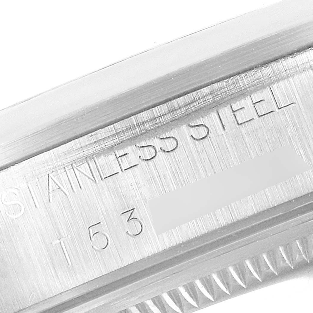 This close-up image shows the stainless steel case with engravings on the Rolex Air-King 14000 Men's Stainless Steel Pink Dial 14000 Men's Stainless Steel Pink Dial watch.