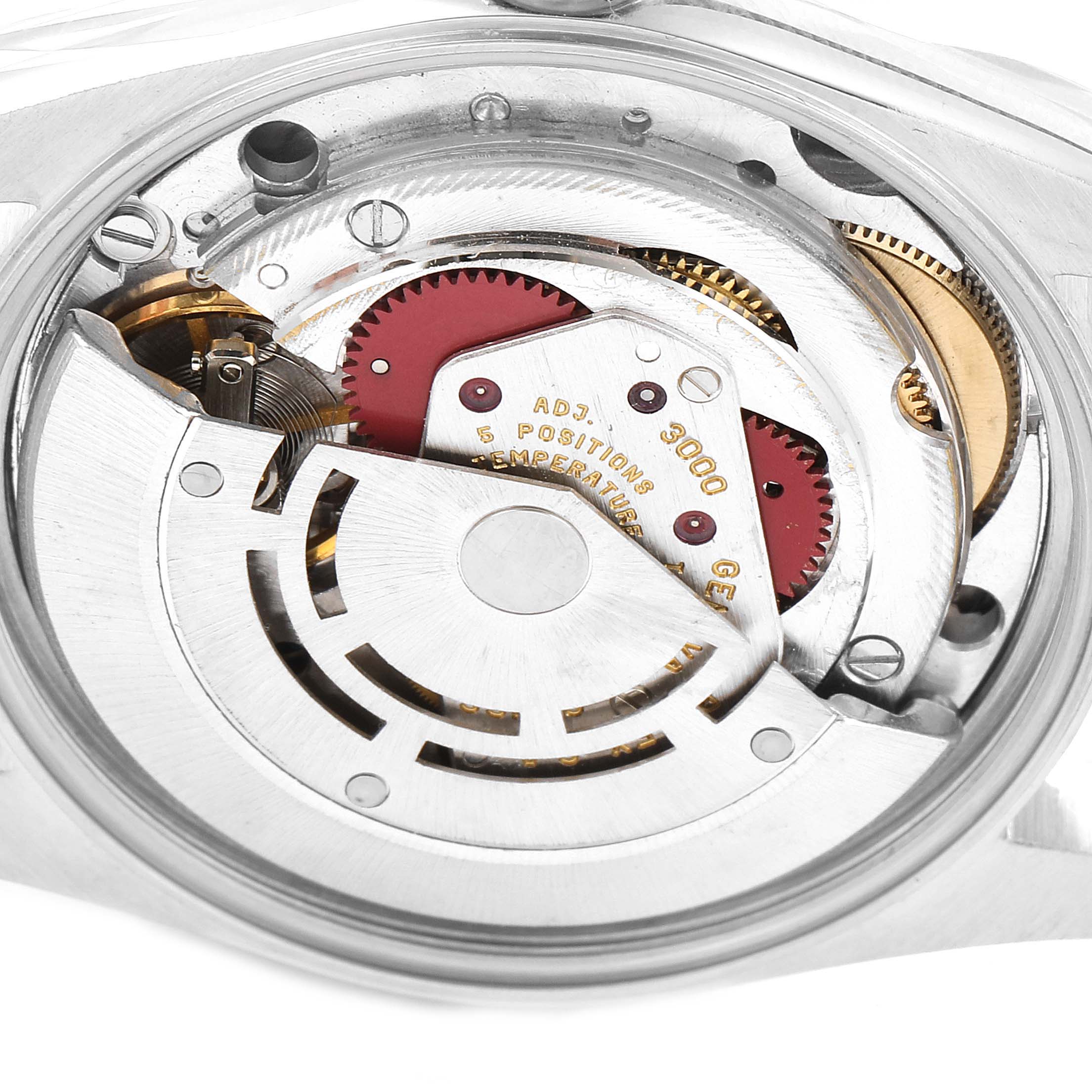 This image shows the internal mechanics of a Rolex Air-King 14000 Men's Stainless Steel Pink Dial 14000 Men's Stainless Steel Pink Dial watch from a close-up, rear angle.