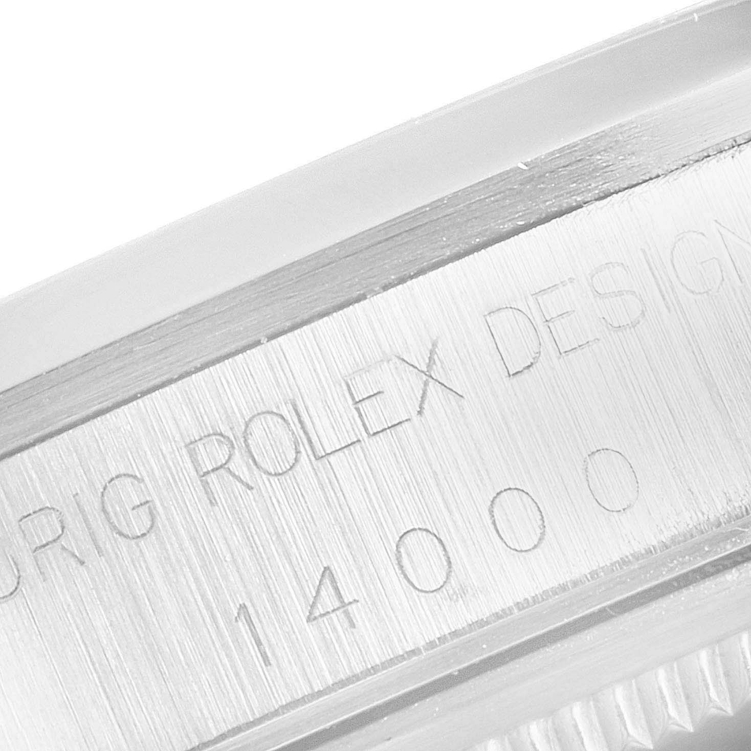 This close-up image shows the engraved side of the Rolex Air-King 14000 Men's Stainless Steel Pink Dial 14000 Men's Stainless Steel Pink Dial watch case.