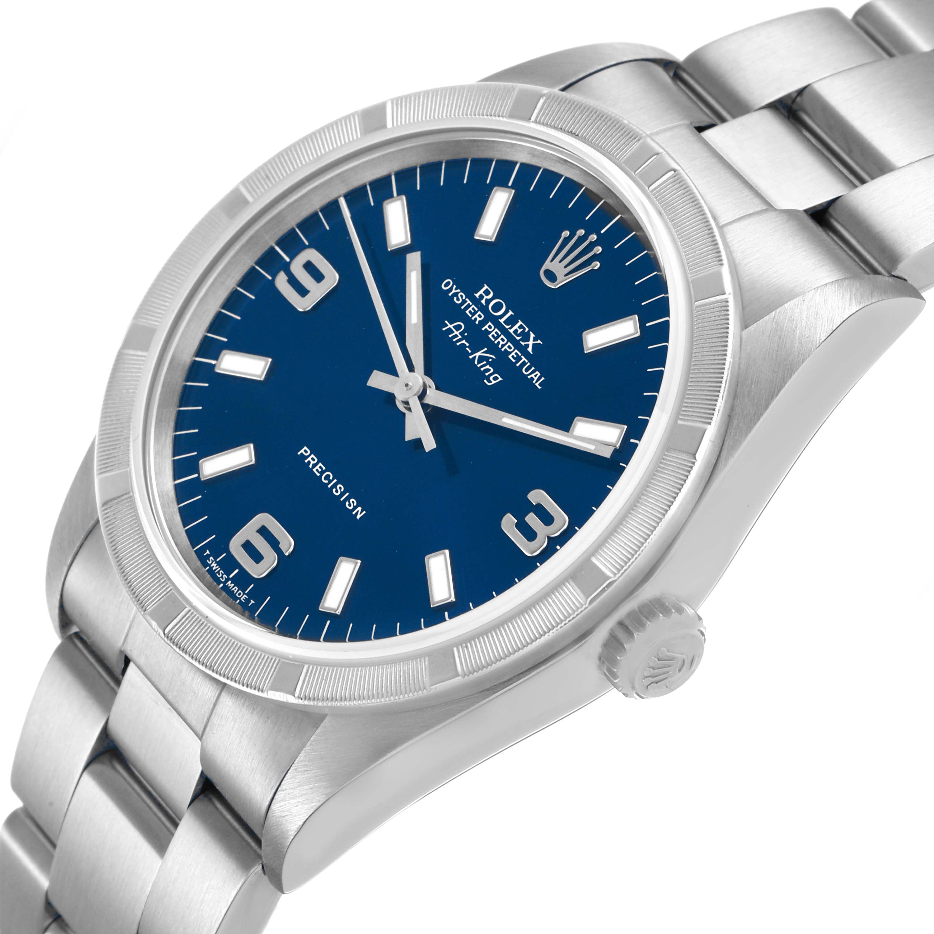 The Rolex Air-King 14010 Men's Stainless Steel Blue Dial watch is shown at an angle highlighting the blue dial, crown, and metal bracelet.