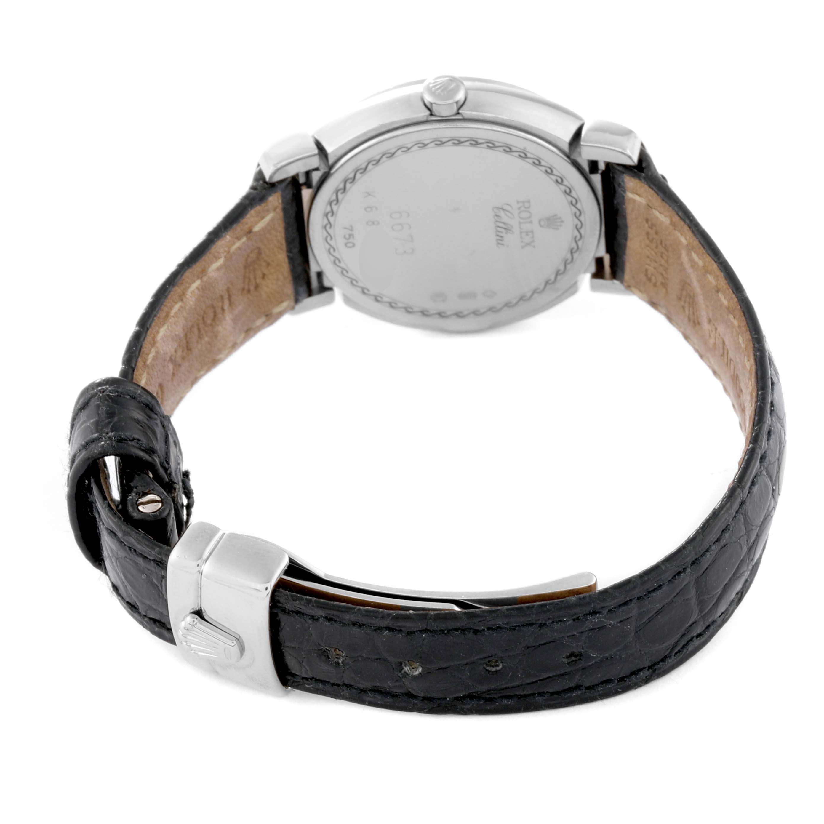 This image shows the back view of a Rolex Cellini 6673 Women's White Gold Mother of Pearl Dial 6673 Women's White Gold Mother of Pearl Dial watch, highlighting its leather strap, clasp, and case back.