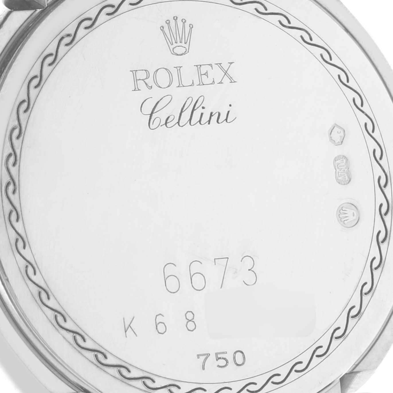 This image shows the back case of a Rolex Cellini 6673 Women's White Gold Mother of Pearl Dial 6673 Women's White Gold Mother of Pearl Dial watch, featuring the brand name, model name, and identifying hallmarks.