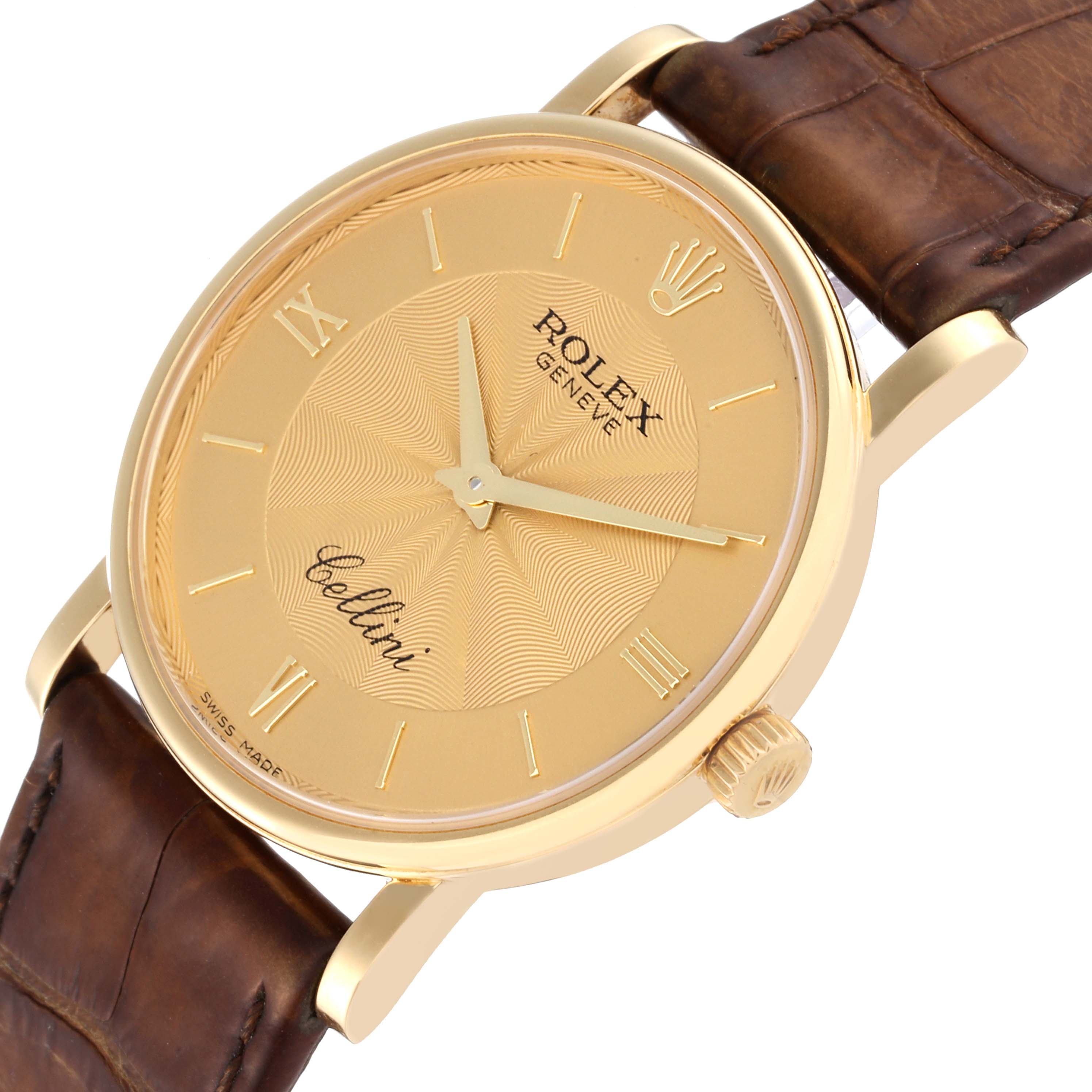 The Rolex Cellini 5115 Men's Yellow Gold Champagne Dial 5115 Men's Yellow Gold Champagne Dial watch is shown at an angled view, highlighting the watch face, crown, and part of the leather strap.