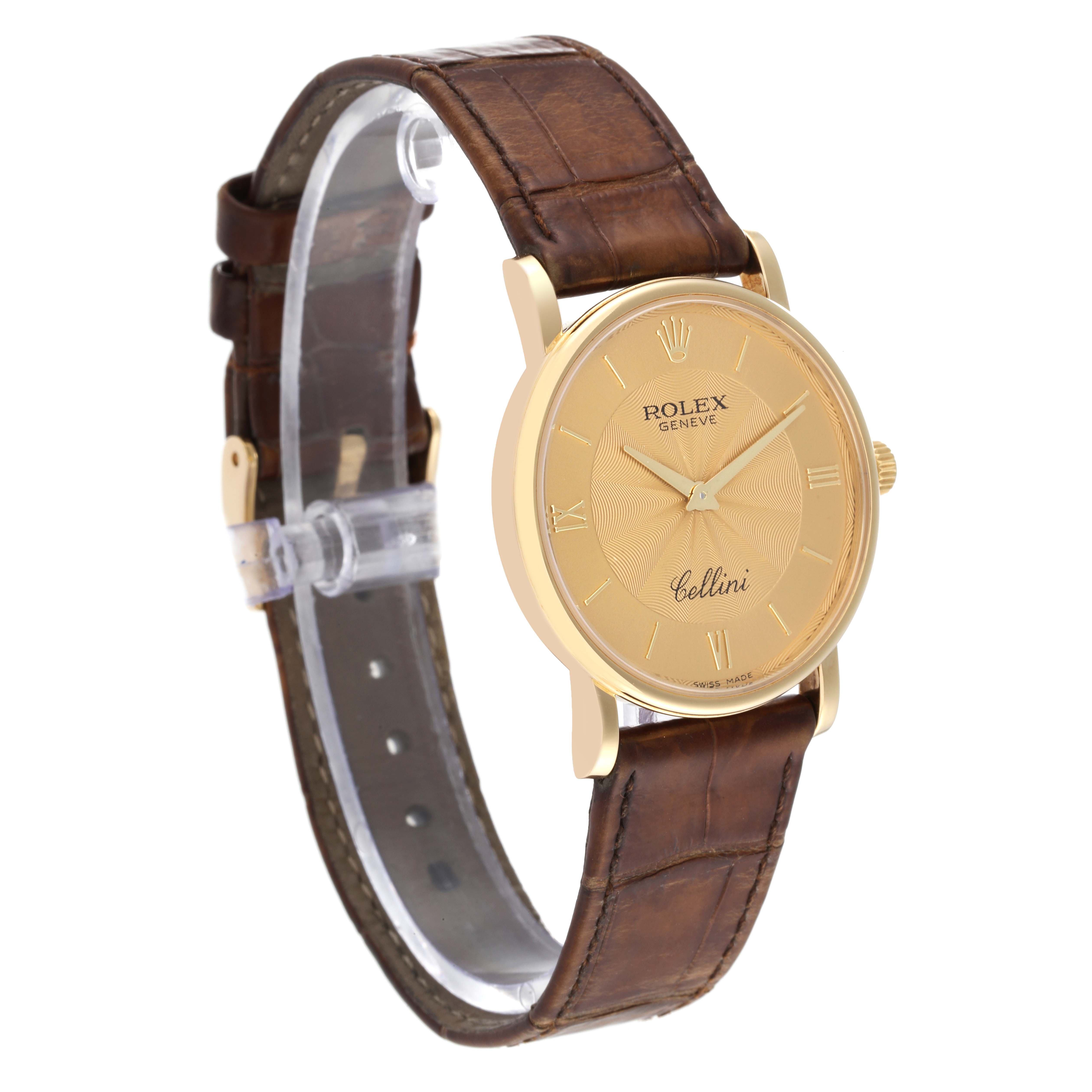 The Rolex Cellini 5115 Men's Yellow Gold Champagne Dial 5115 Men's Yellow Gold Champagne Dial watch is shown at a slight side angle, displaying the dial, case, and leather strap.