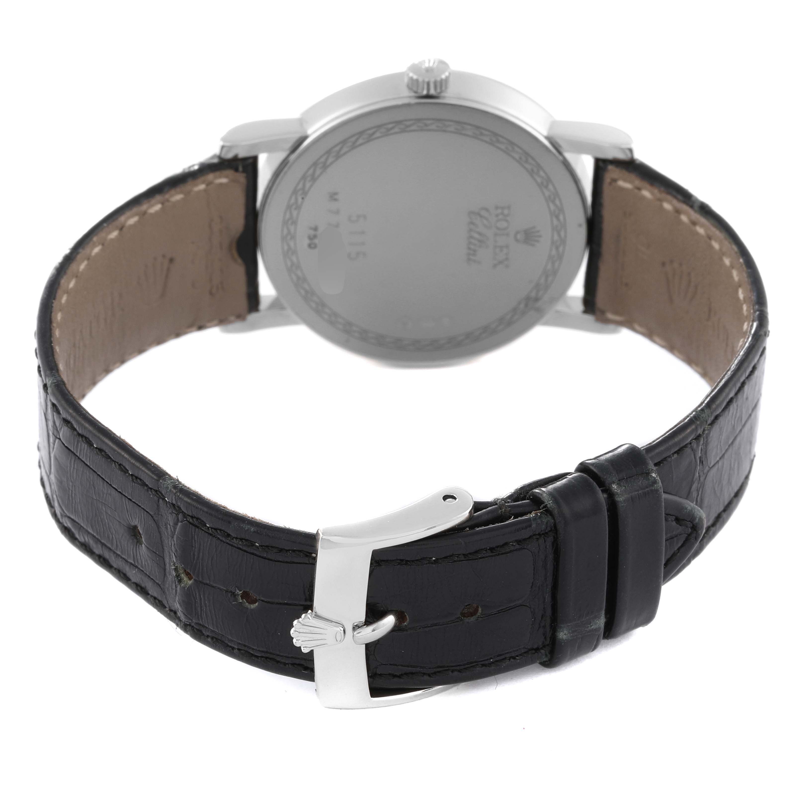 The image shows the back view of a Rolex Cellini 5115 Men's White Gold Silver Dial 5115 Men's White Gold Silver Dial watch, highlighting the case back and black leather strap with a silver buckle.