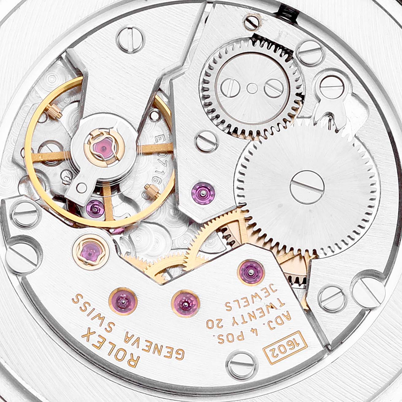 The image shows the intricate internal mechanism of a Rolex Cellini 5115 Men's White Gold Silver Dial 5115 Men's White Gold Silver Dial watch, highlighting gears and jewels.