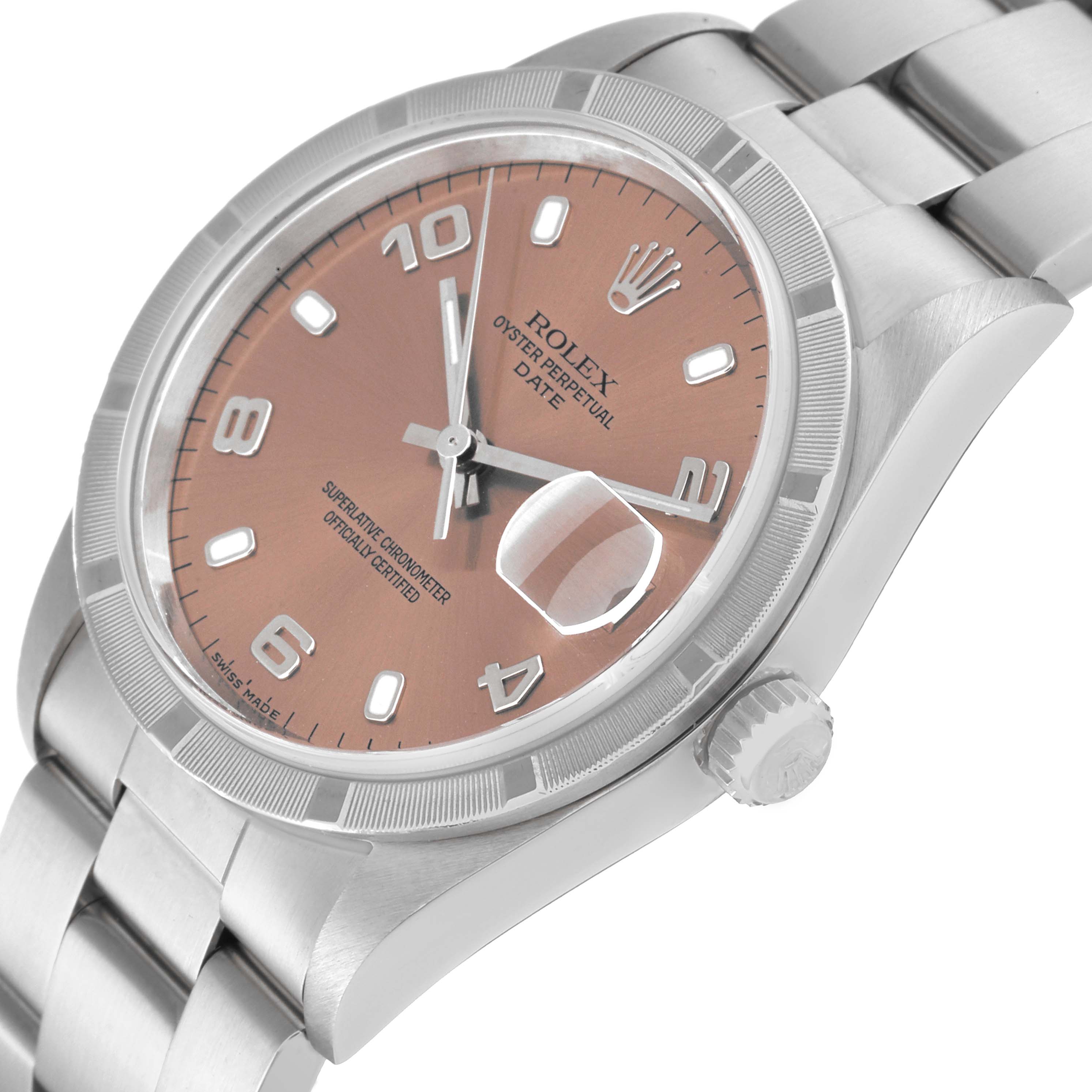 The image shows a close-up of a Rolex Date 15210 Men's Stainless Steel Pink Dial 15210 Men's Stainless Steel Pink Dial model watch at an angle highlighting its dial, bezel, crown, and bracelet.