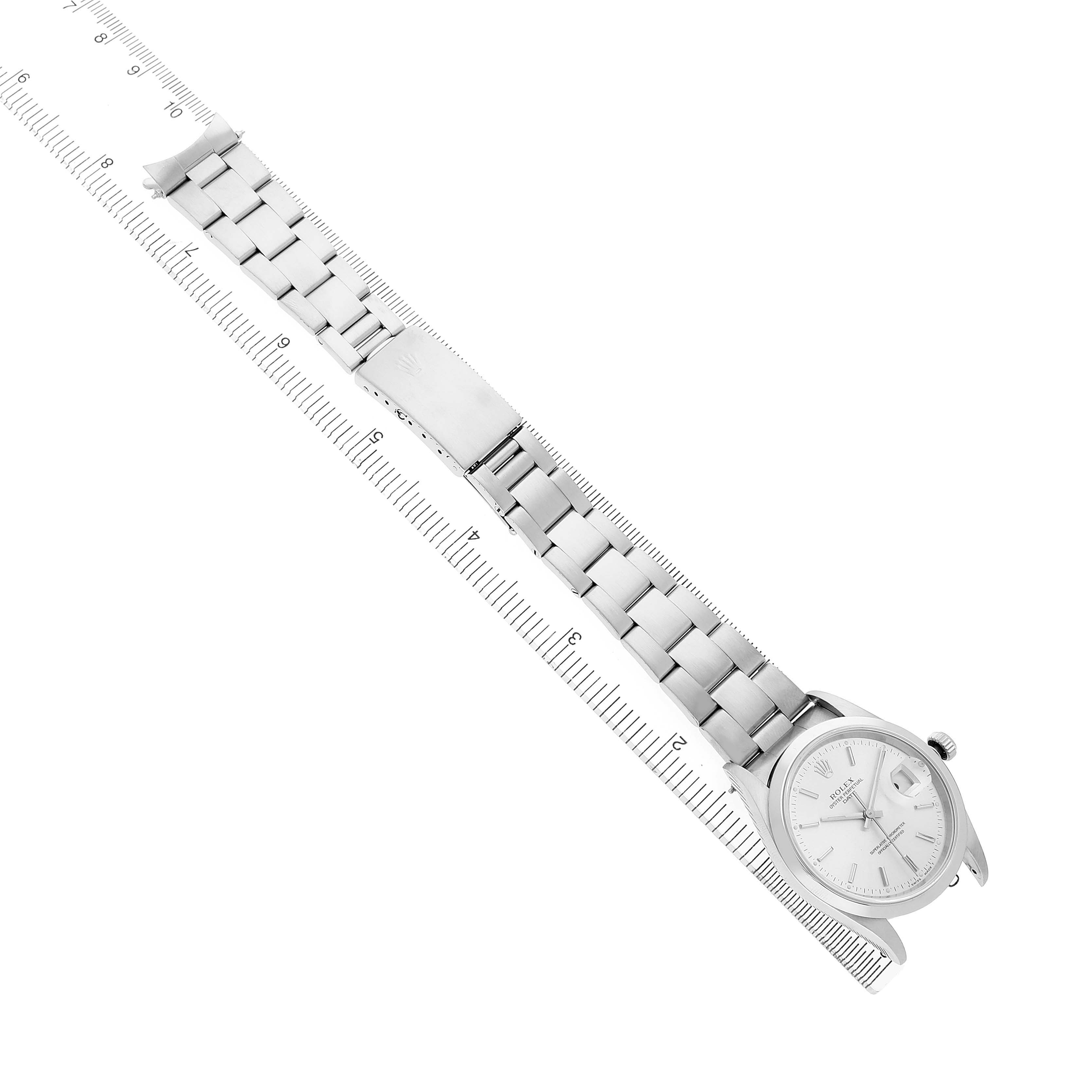 The Rolex Date 15200 Men's Stainless Steel Silver Dial model watch is shown from a top-down angle, displaying the full bracelet, clasp, and face.