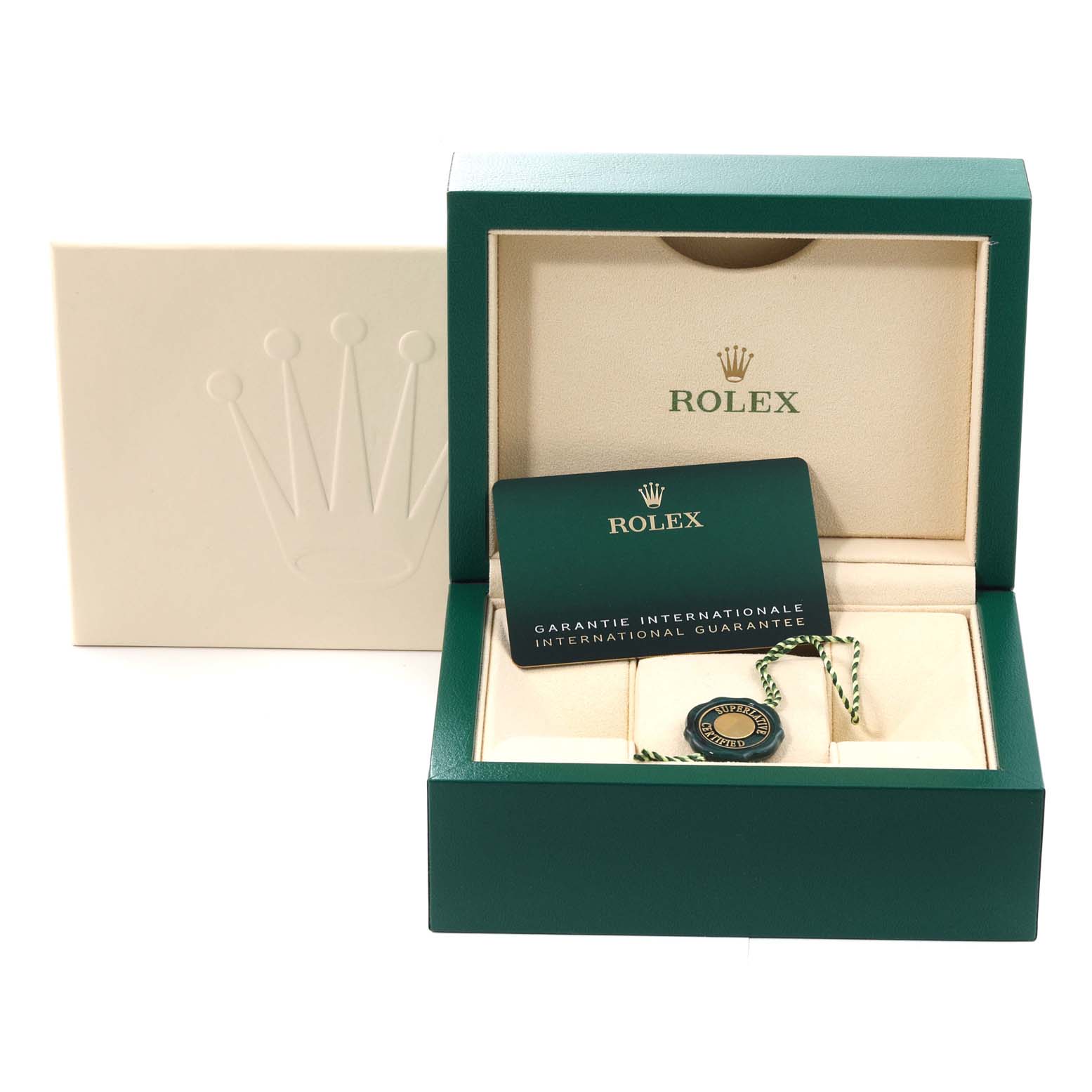 The image shows a Rolex Mid-Size 278274 Women
s Stainless Steel Blue Dial 278274 Women
s Stainless Steel Blue Dial model box with an international guarantee card and tag displayed inside.