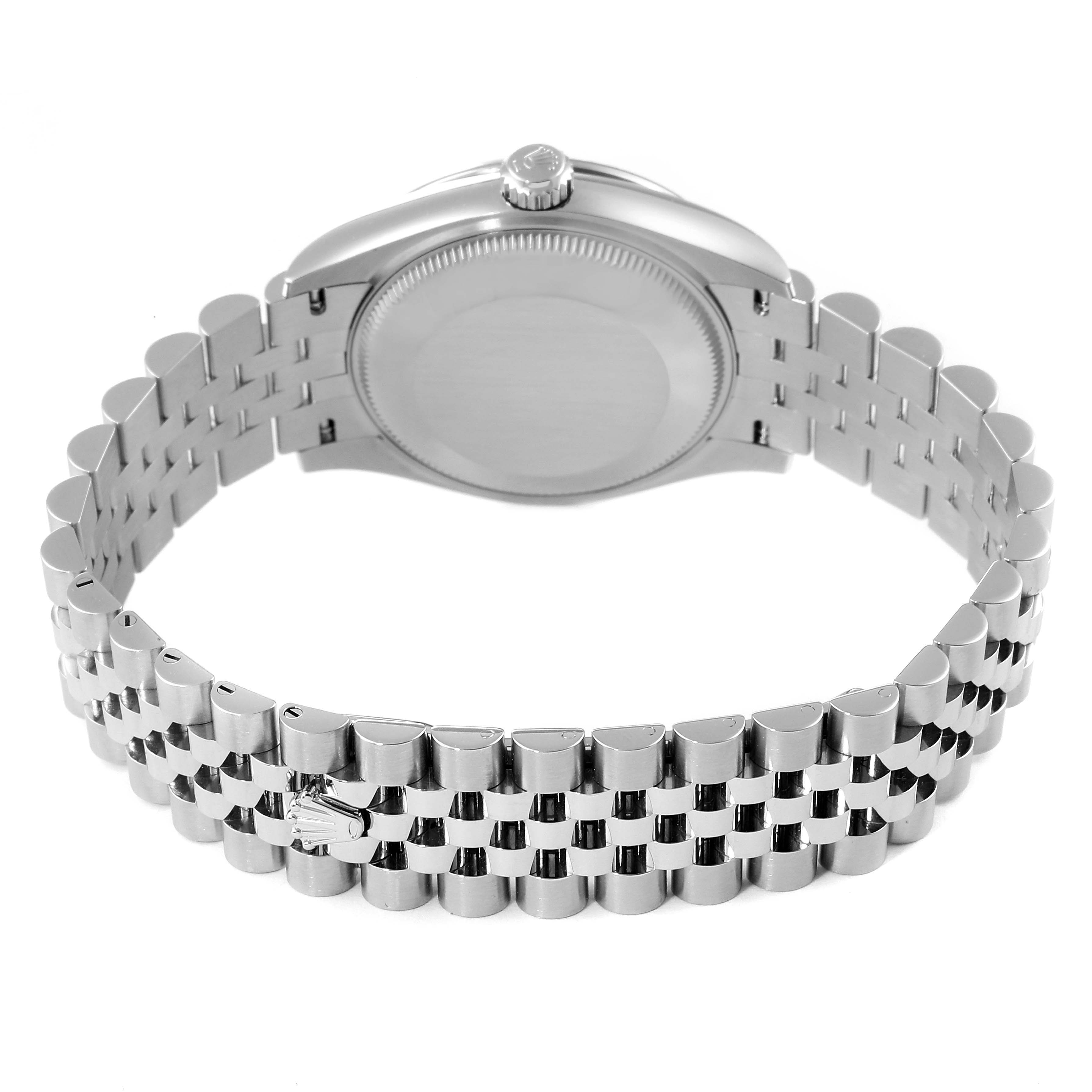 The image shows the back of a Mid-Size Rolex watch with a visible bracelet and crown.